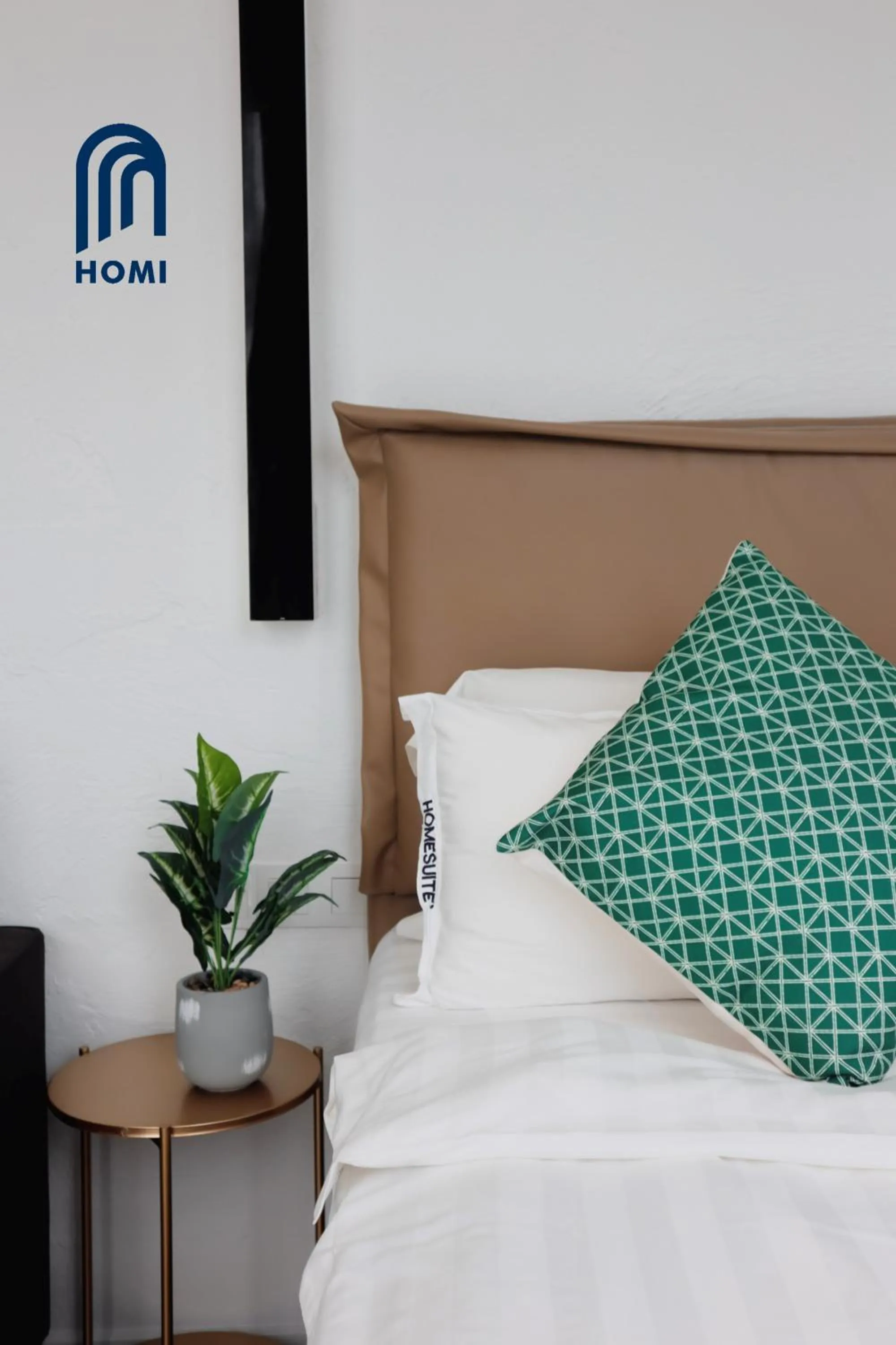 Photo of the whole room, Bed in Homi Oasis at KK Times Square 和逸绿洲