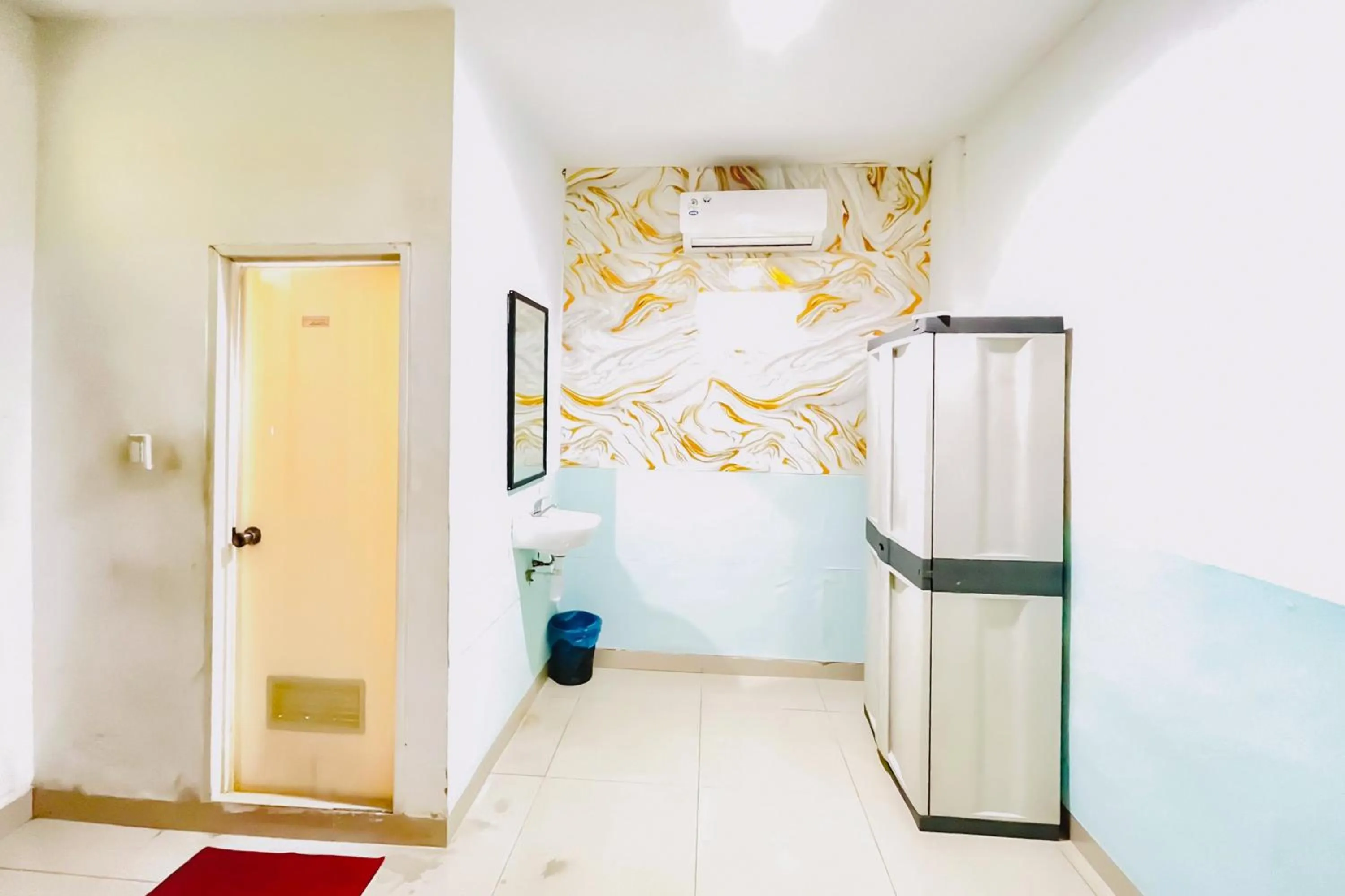 Bedroom in RedDoorz at STM Suite Medan Amplas