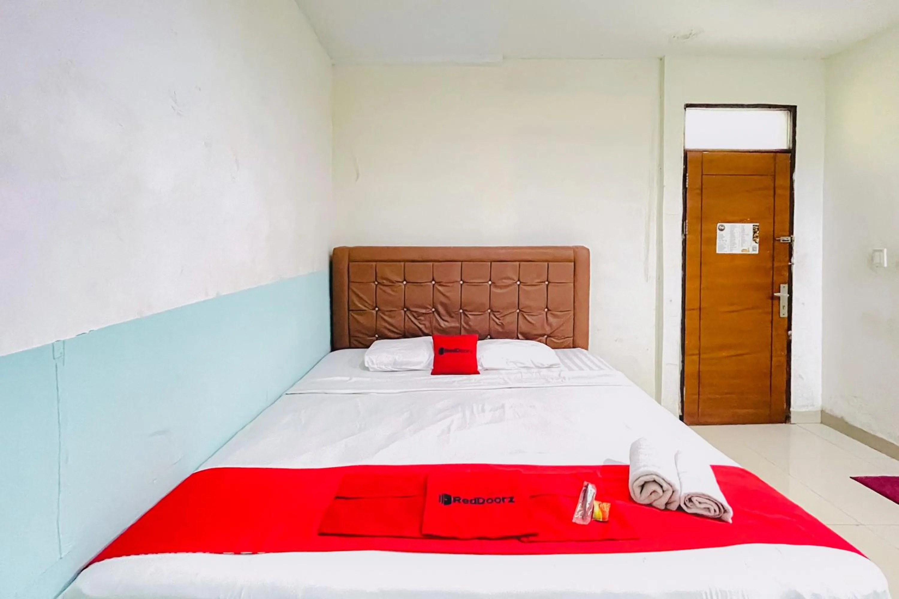 Bedroom, Bed in RedDoorz at STM Suite Medan Amplas