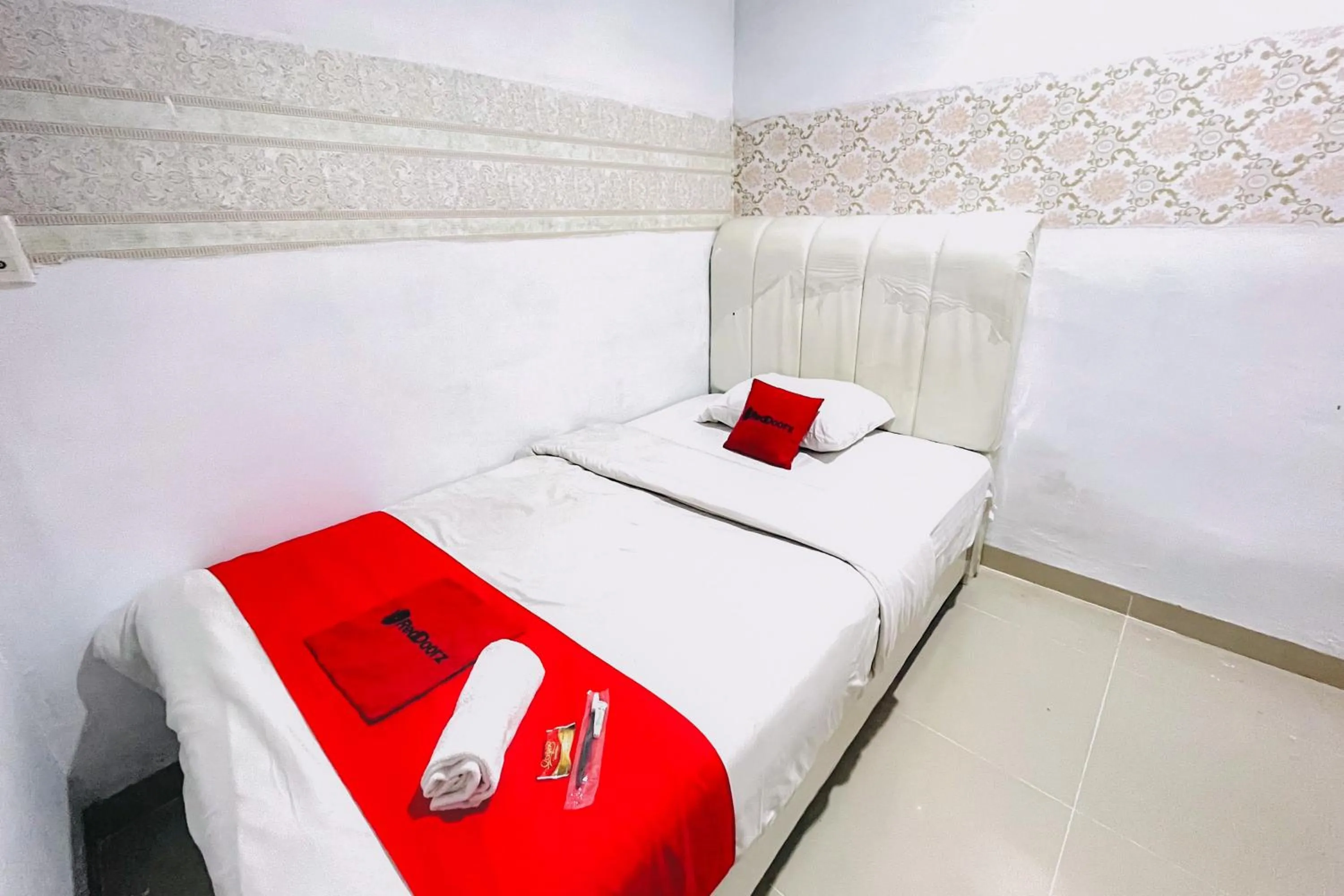 Bedroom, Bed in RedDoorz at STM Suite Medan Amplas