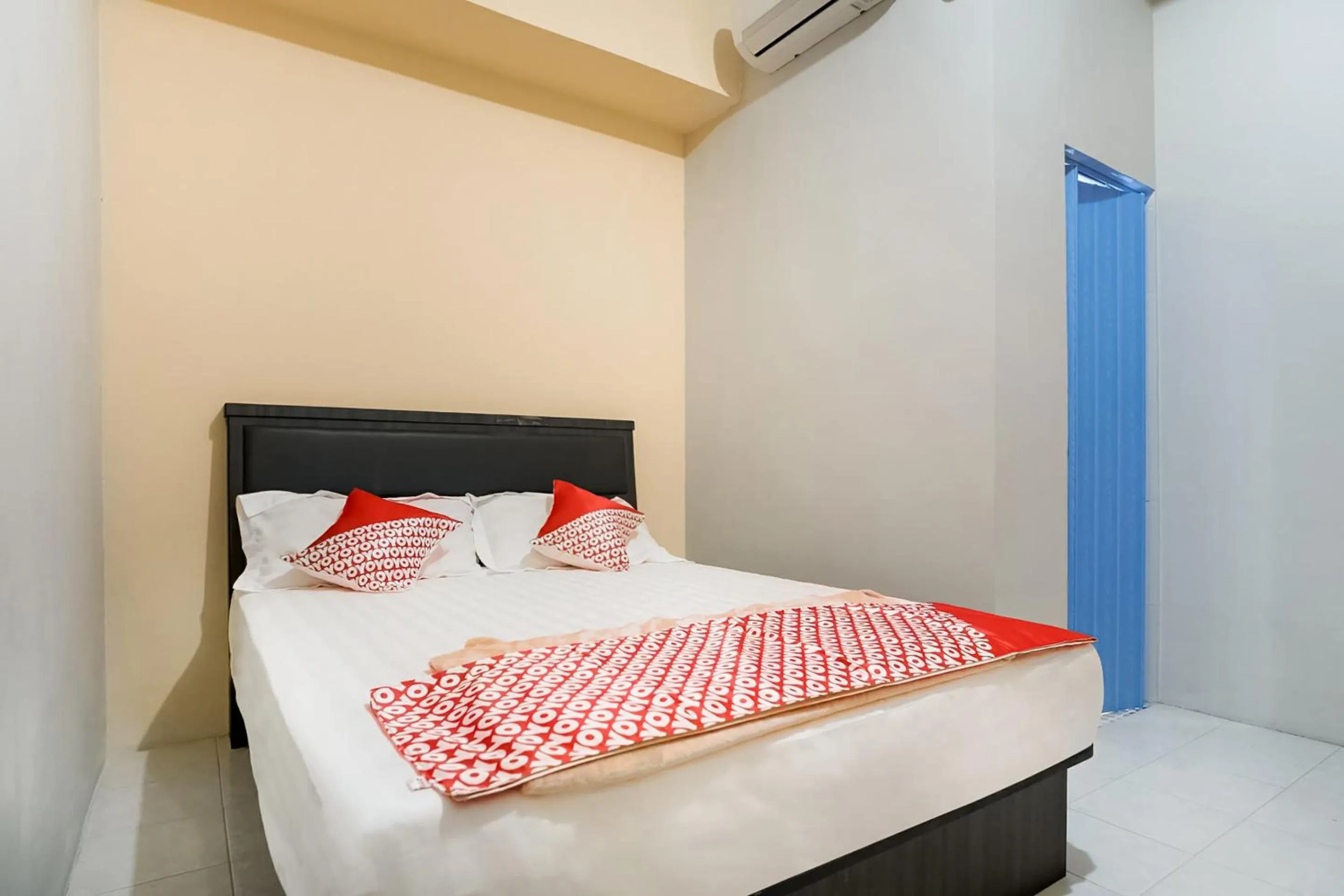 Bedroom in OYO 3212 Coffee Jodoh Homestay