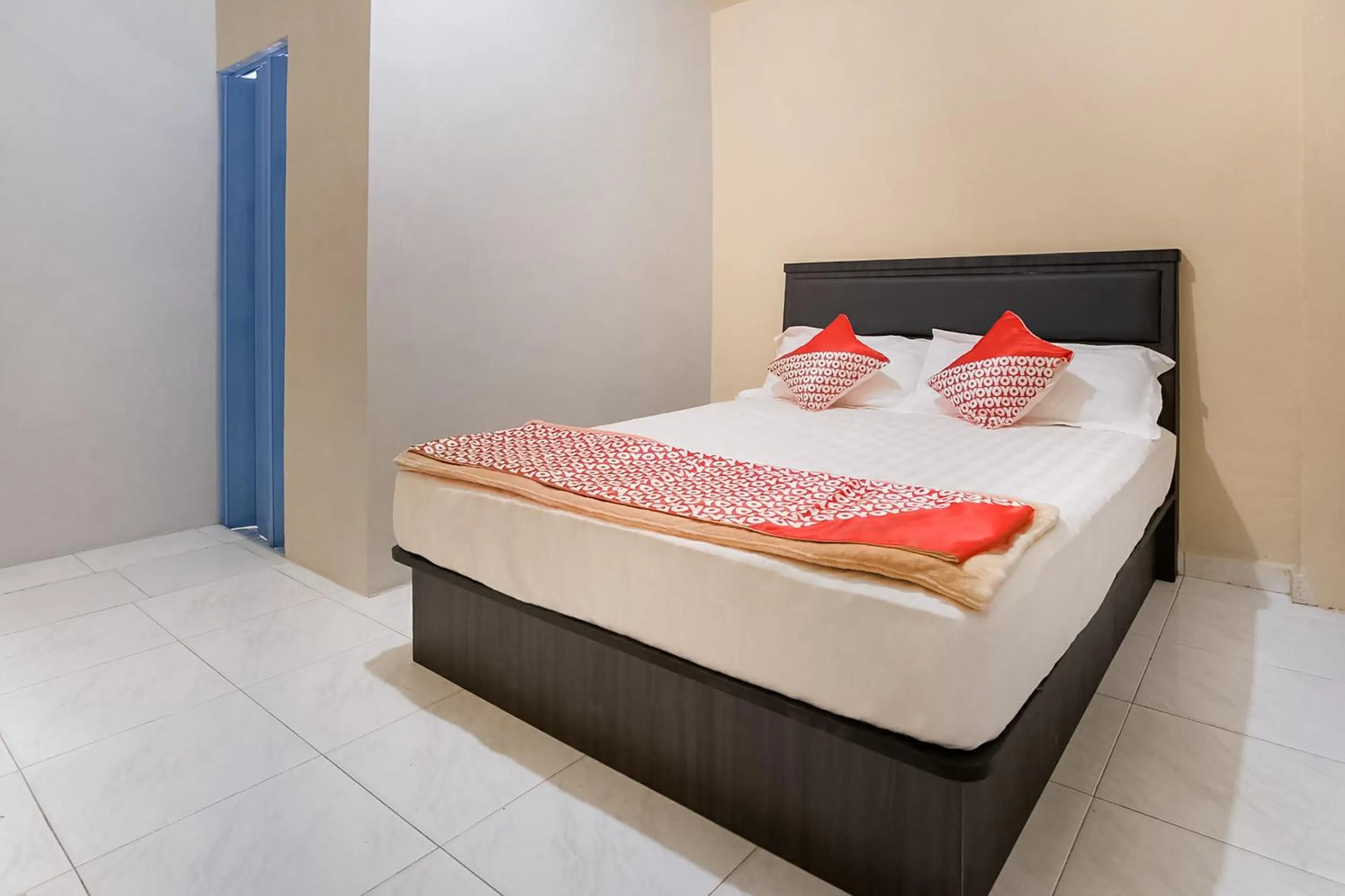 Bedroom in OYO 3212 Coffee Jodoh Homestay