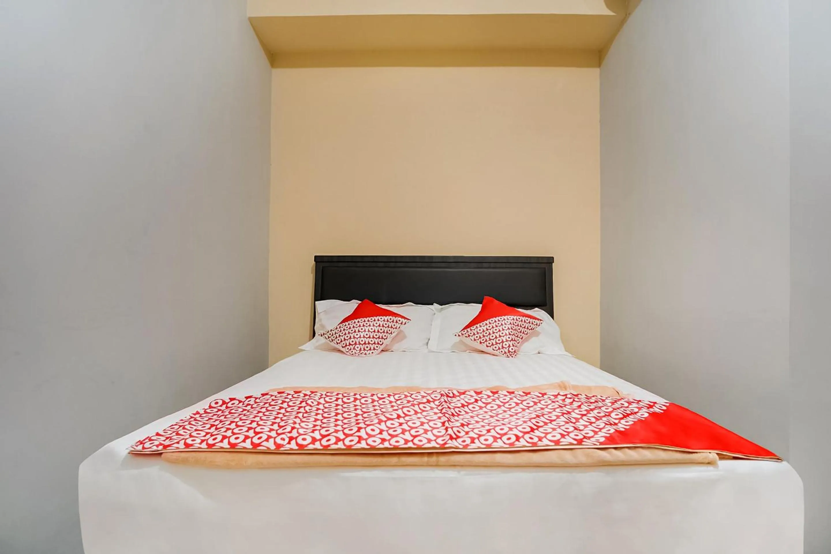 Bedroom in OYO 3212 Coffee Jodoh Homestay