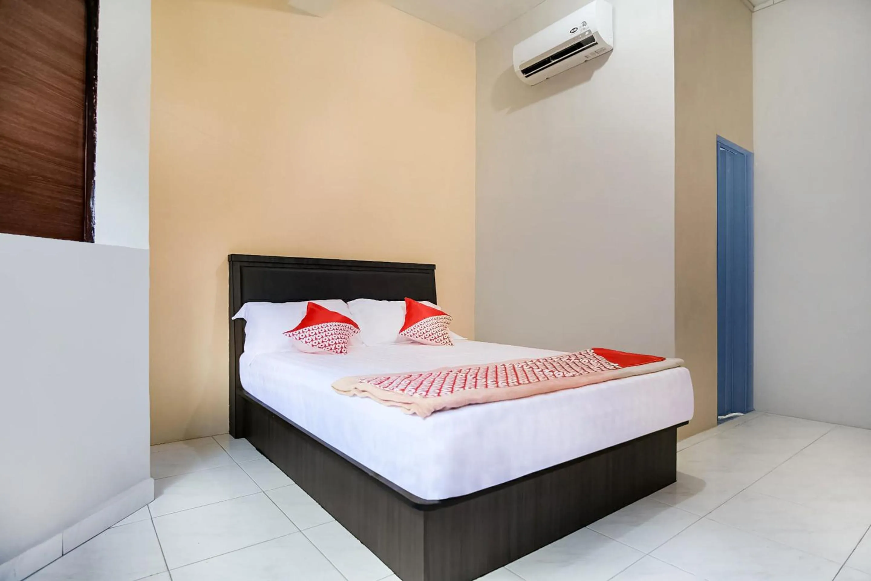 Bedroom in OYO 3212 Coffee Jodoh Homestay