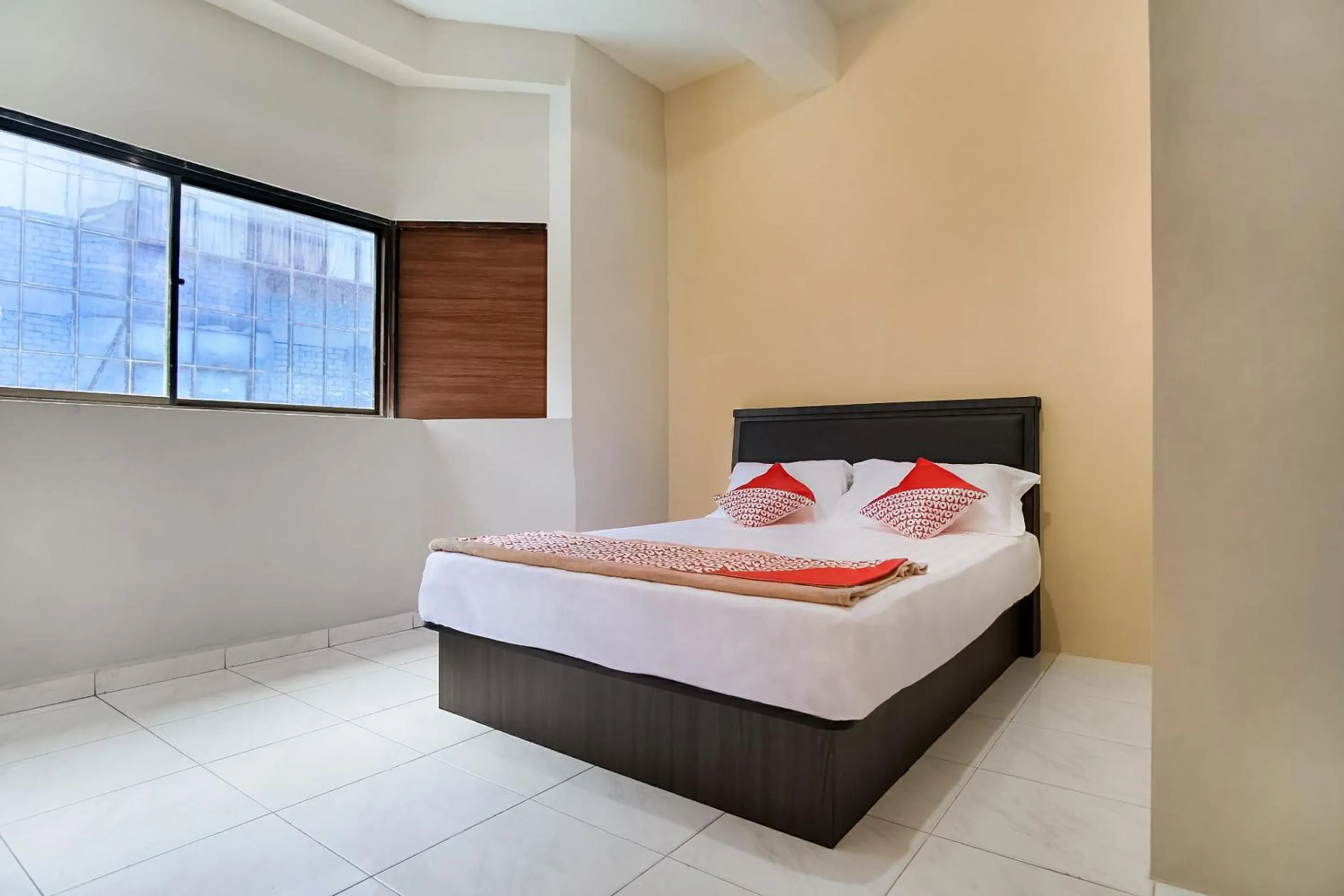 Bedroom in OYO 3212 Coffee Jodoh Homestay