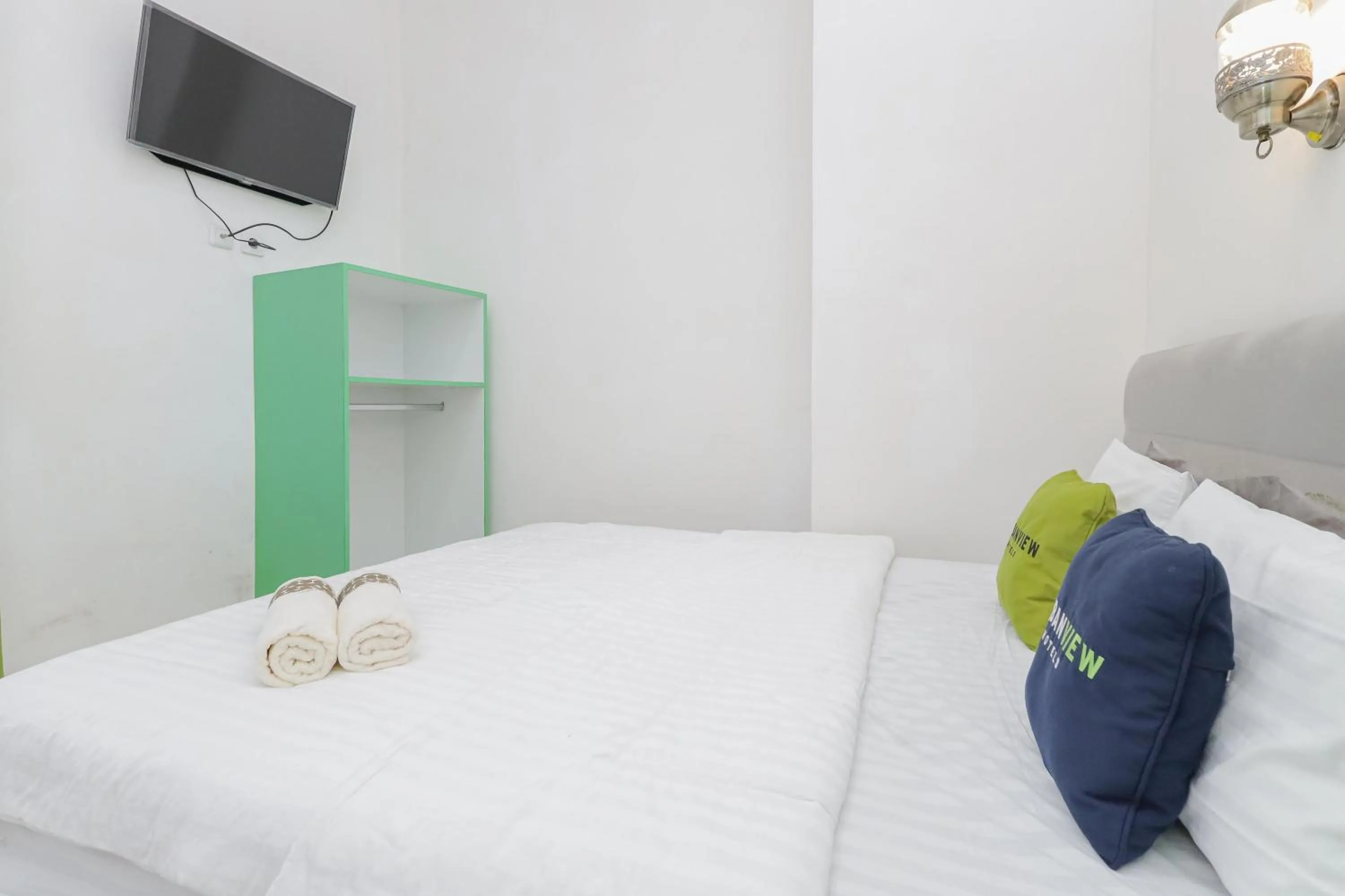 Bedroom in Urbanview Hotel Near Jatim Park 3 by RedDoorz