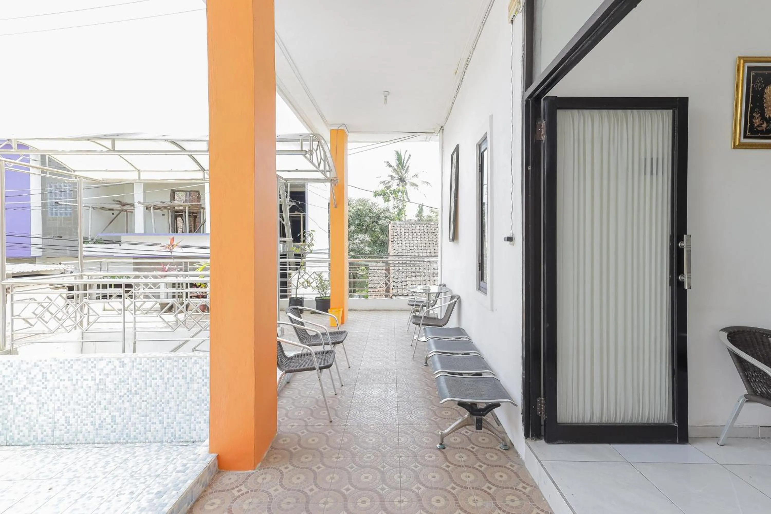 Balcony/Terrace in Urbanview Hotel Near Jatim Park 3 by RedDoorz