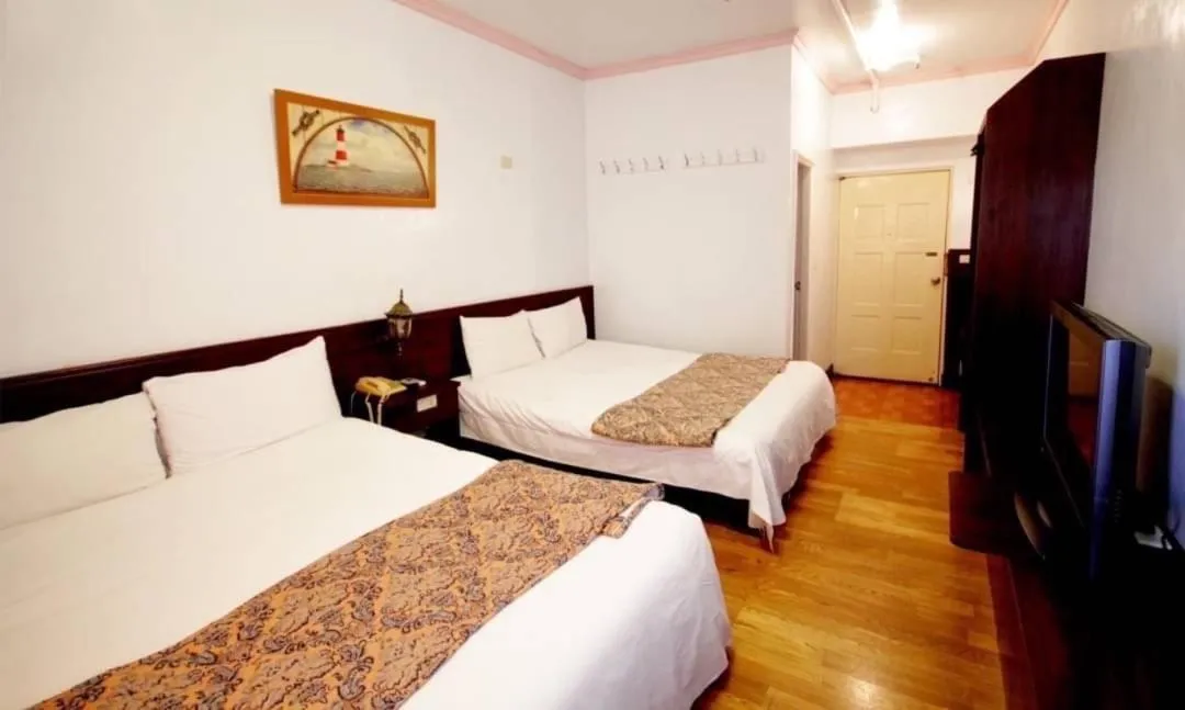 Photo of the whole room, Bed in Kenting Maldives Hotspring Hotel