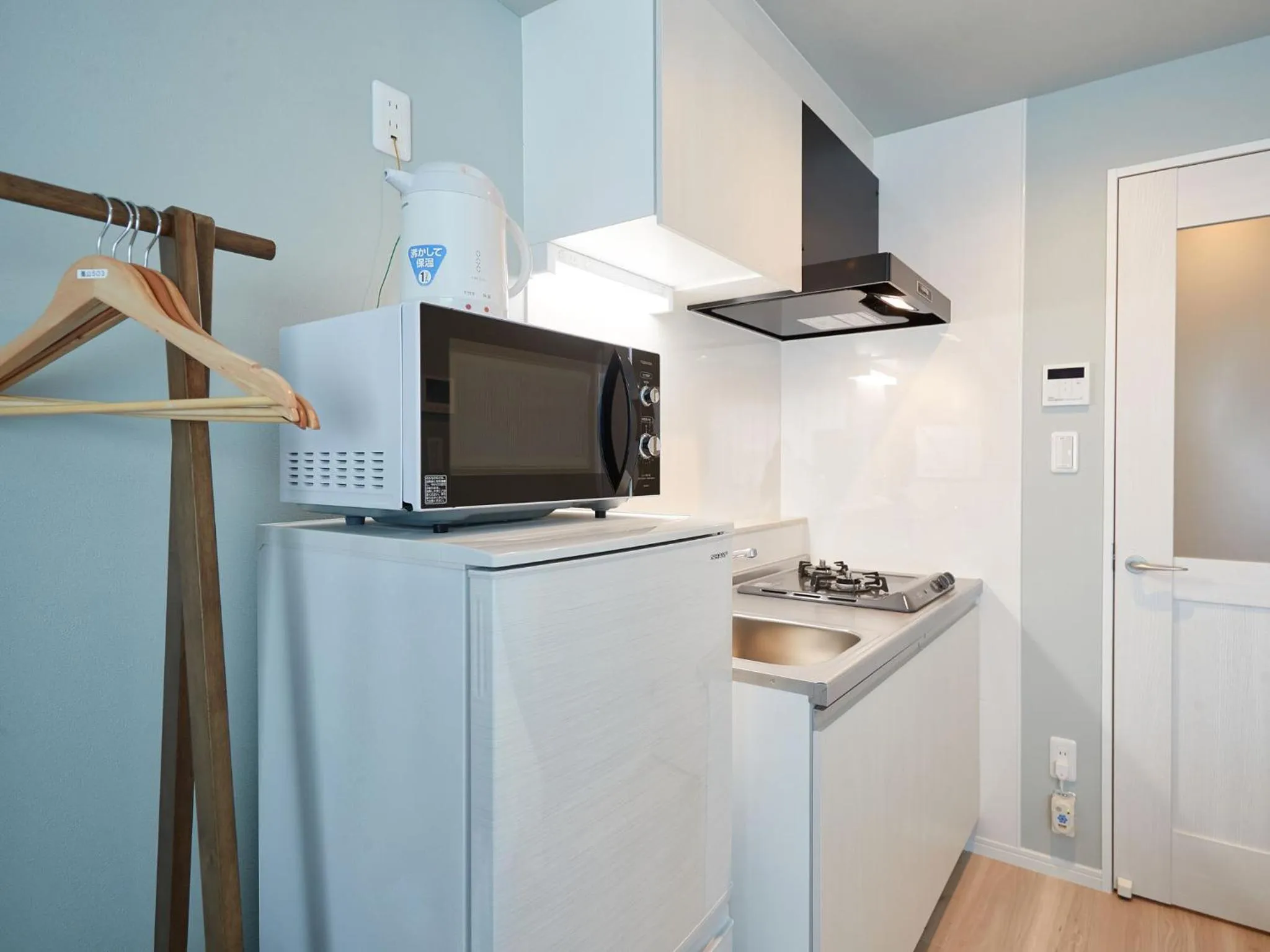 Kitchen or kitchenette in Tenpoint Hotel OKOU