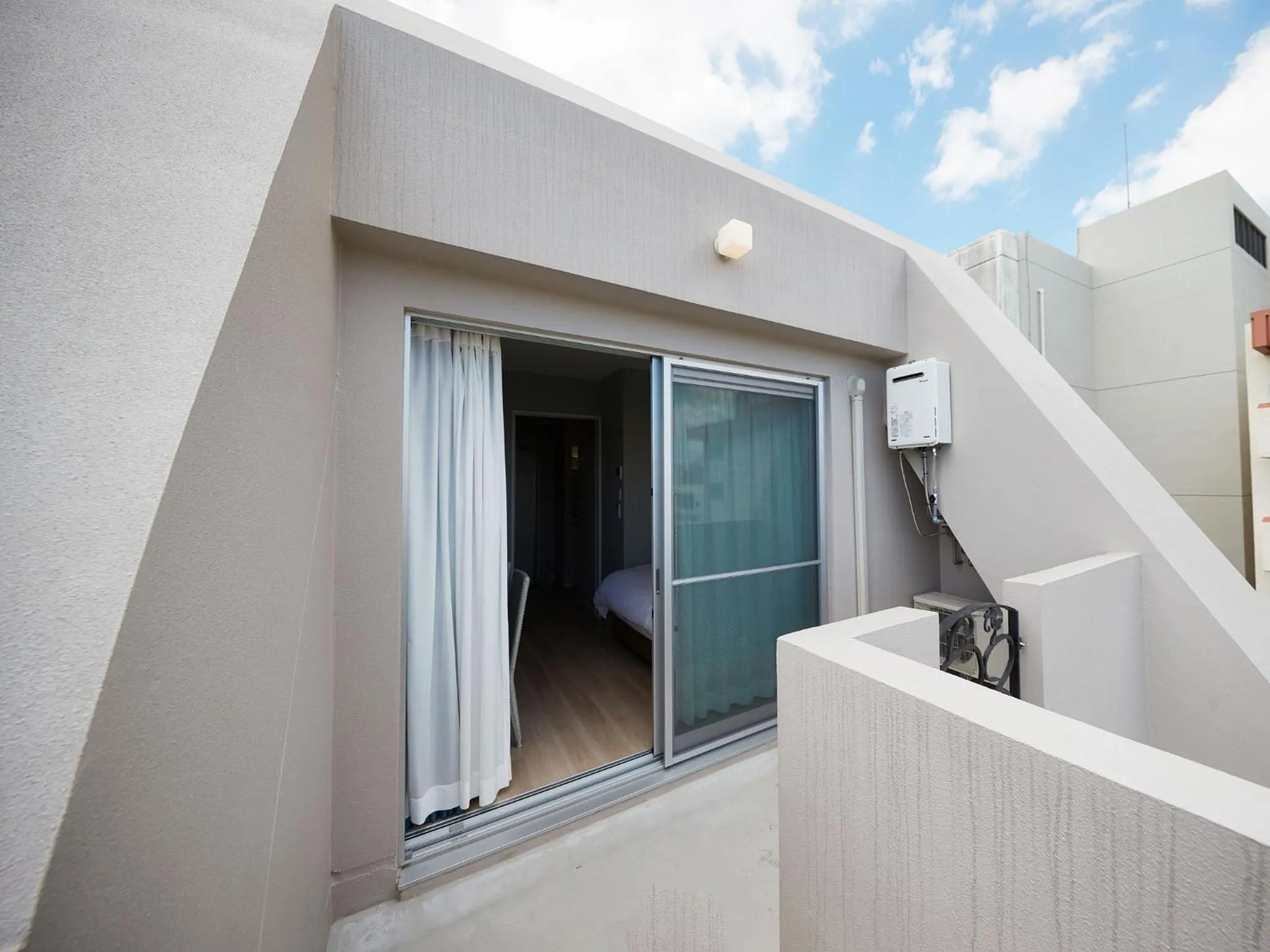 Photo of the whole room in Tenpoint Hotel OKOU