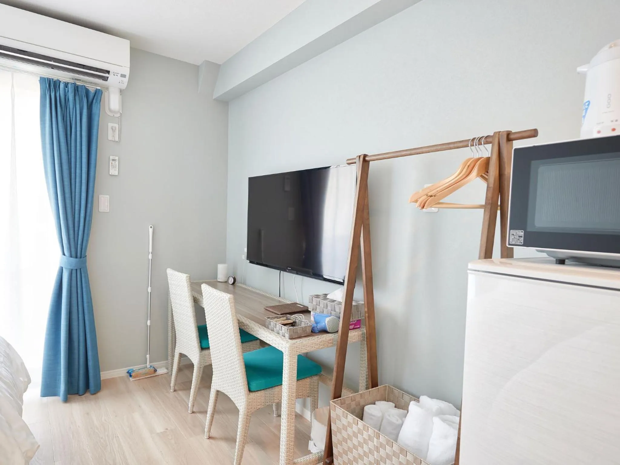 Photo of the whole room, TV/Entertainment Center in Tenpoint Hotel OKOU