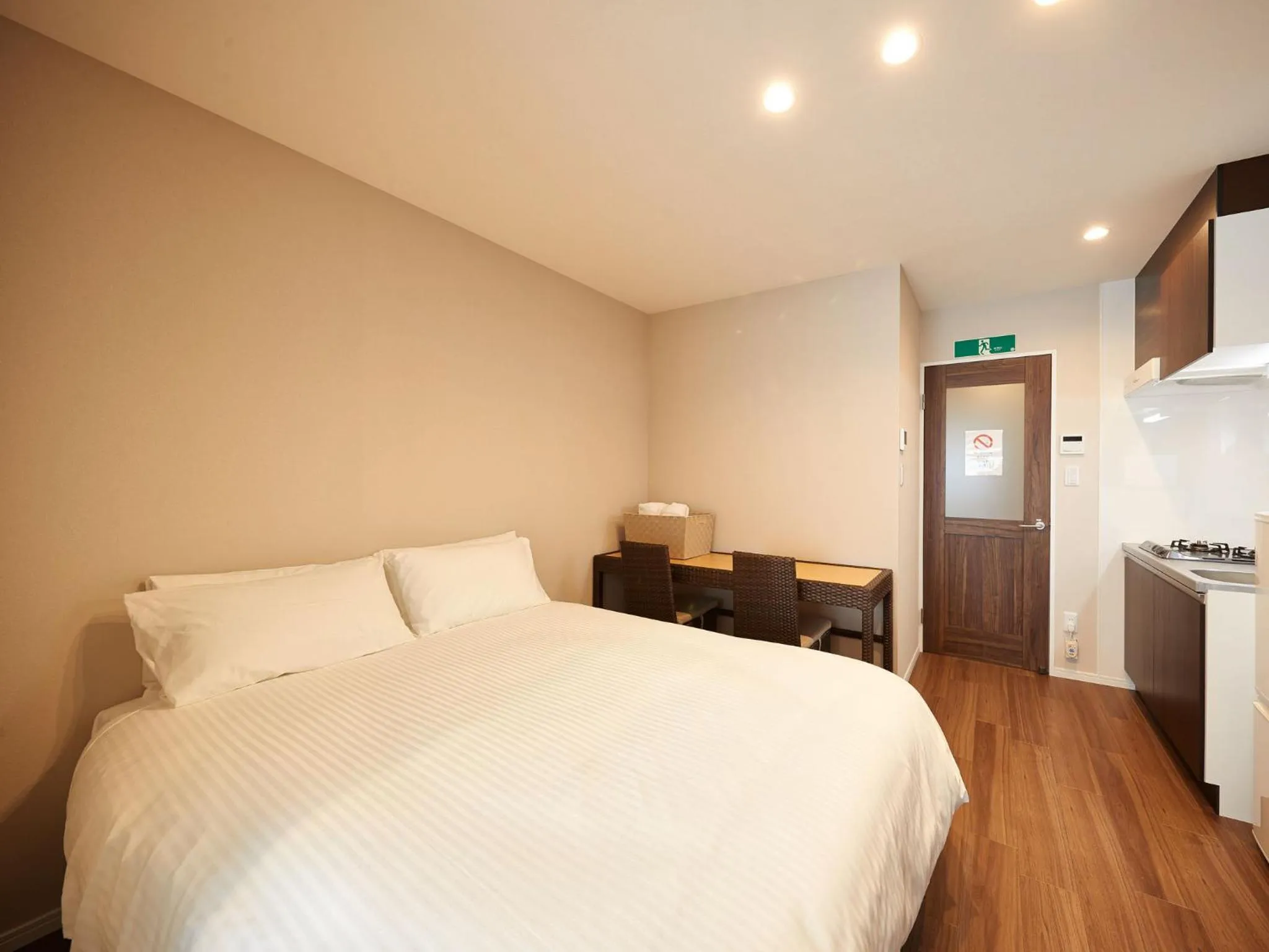 Photo of the whole room, Bed in Tenpoint Hotel OKOU