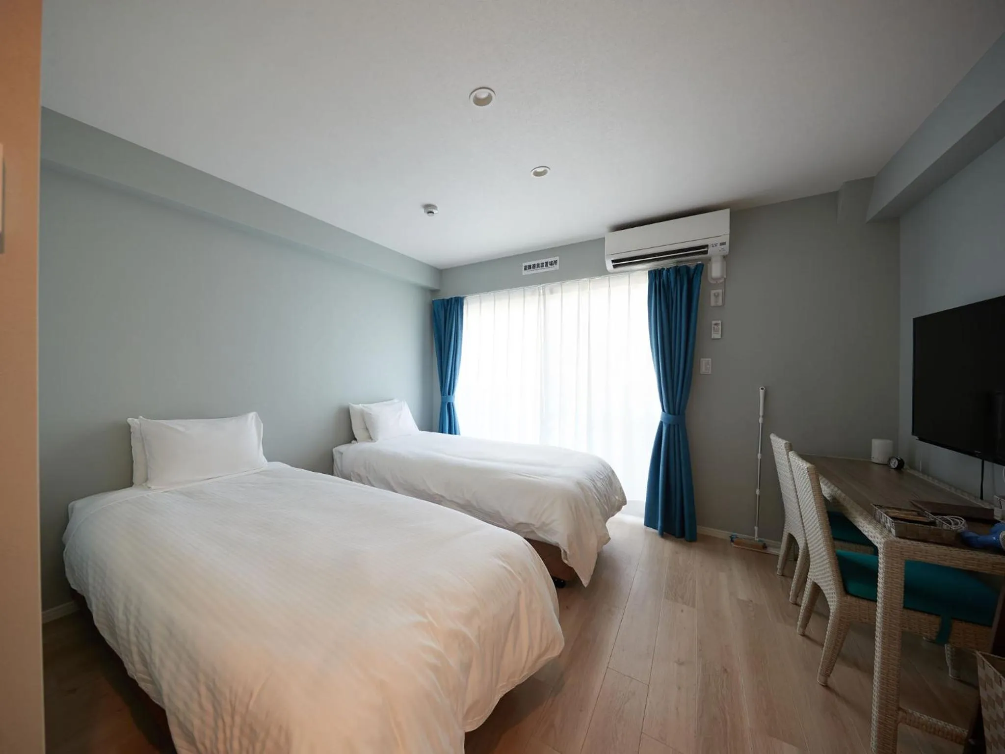 Photo of the whole room, Bed in Tenpoint Hotel OKOU