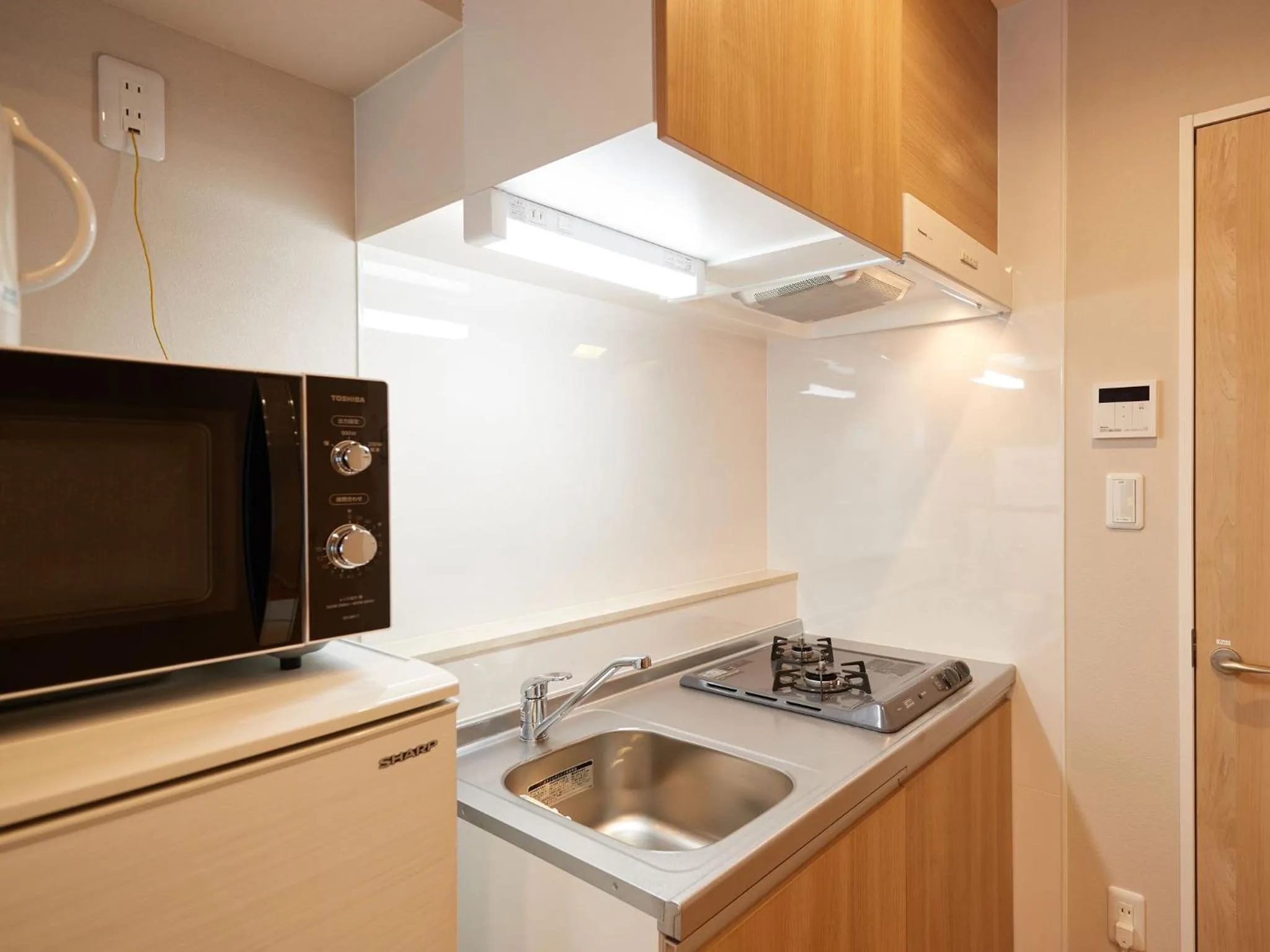 Kitchen or kitchenette, Kitchen/Kitchenette in Tenpoint Hotel OKOU