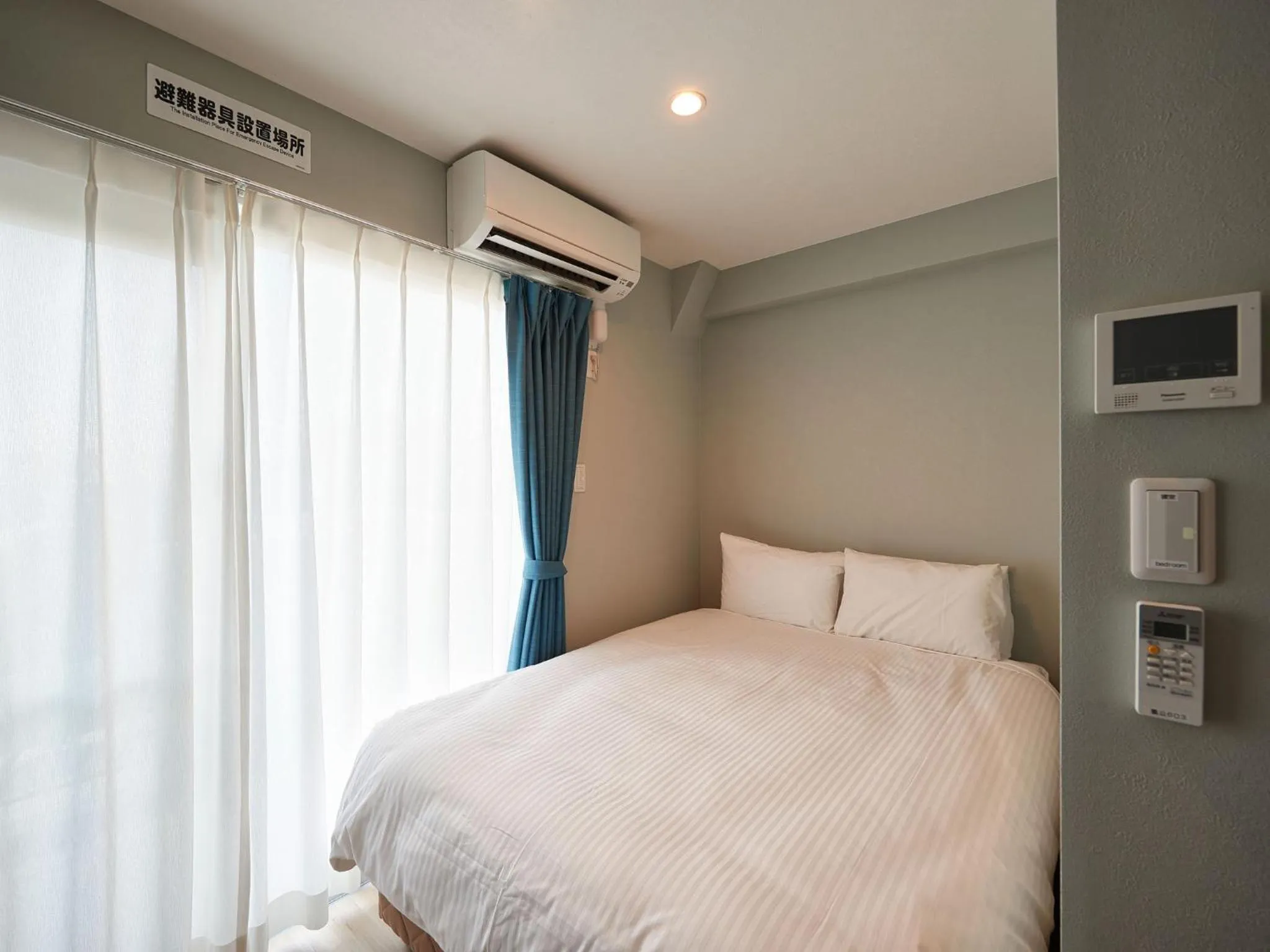 Photo of the whole room, Bed in Tenpoint Hotel OKOU