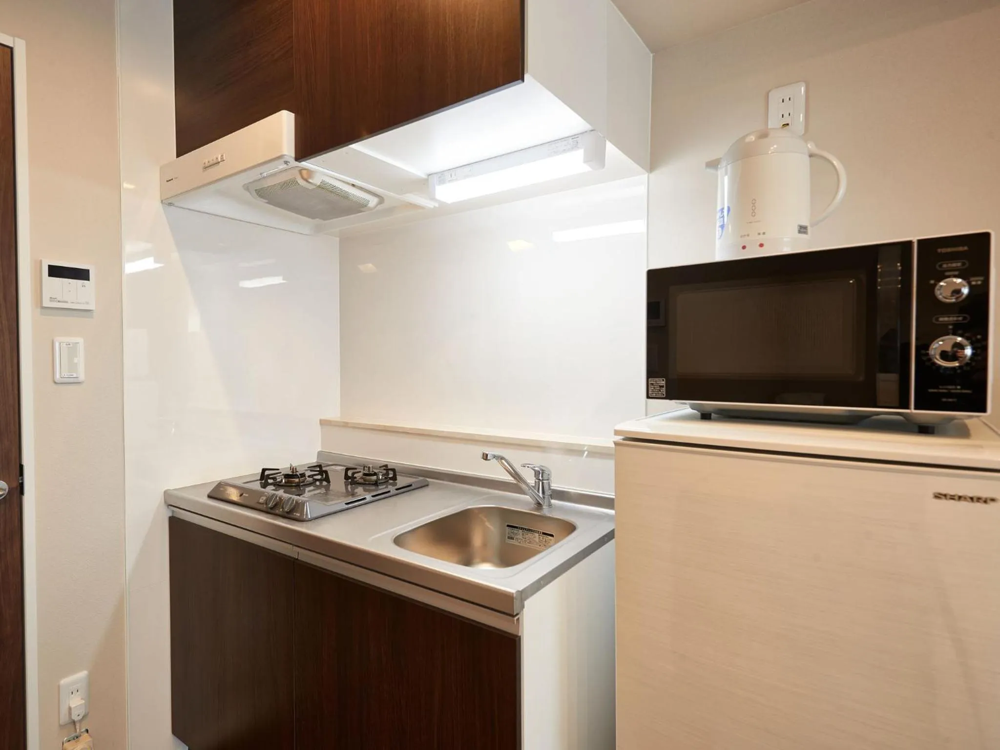 Kitchen or kitchenette, Kitchen/Kitchenette in Tenpoint Hotel OKOU