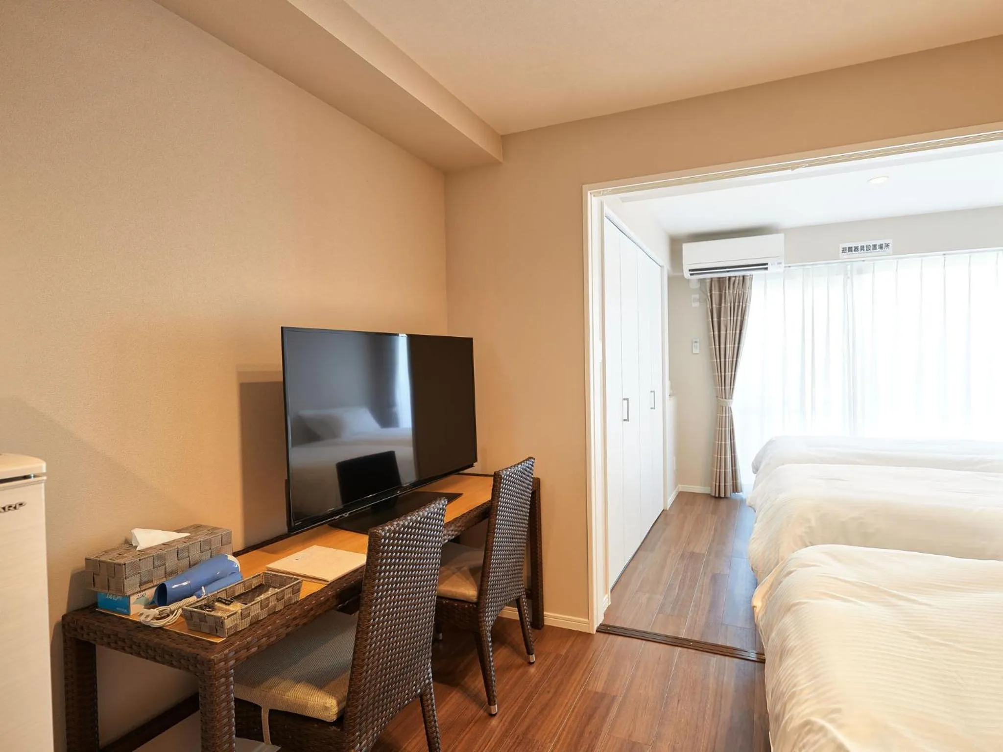 Photo of the whole room, Bed in Tenpoint Hotel OKOU