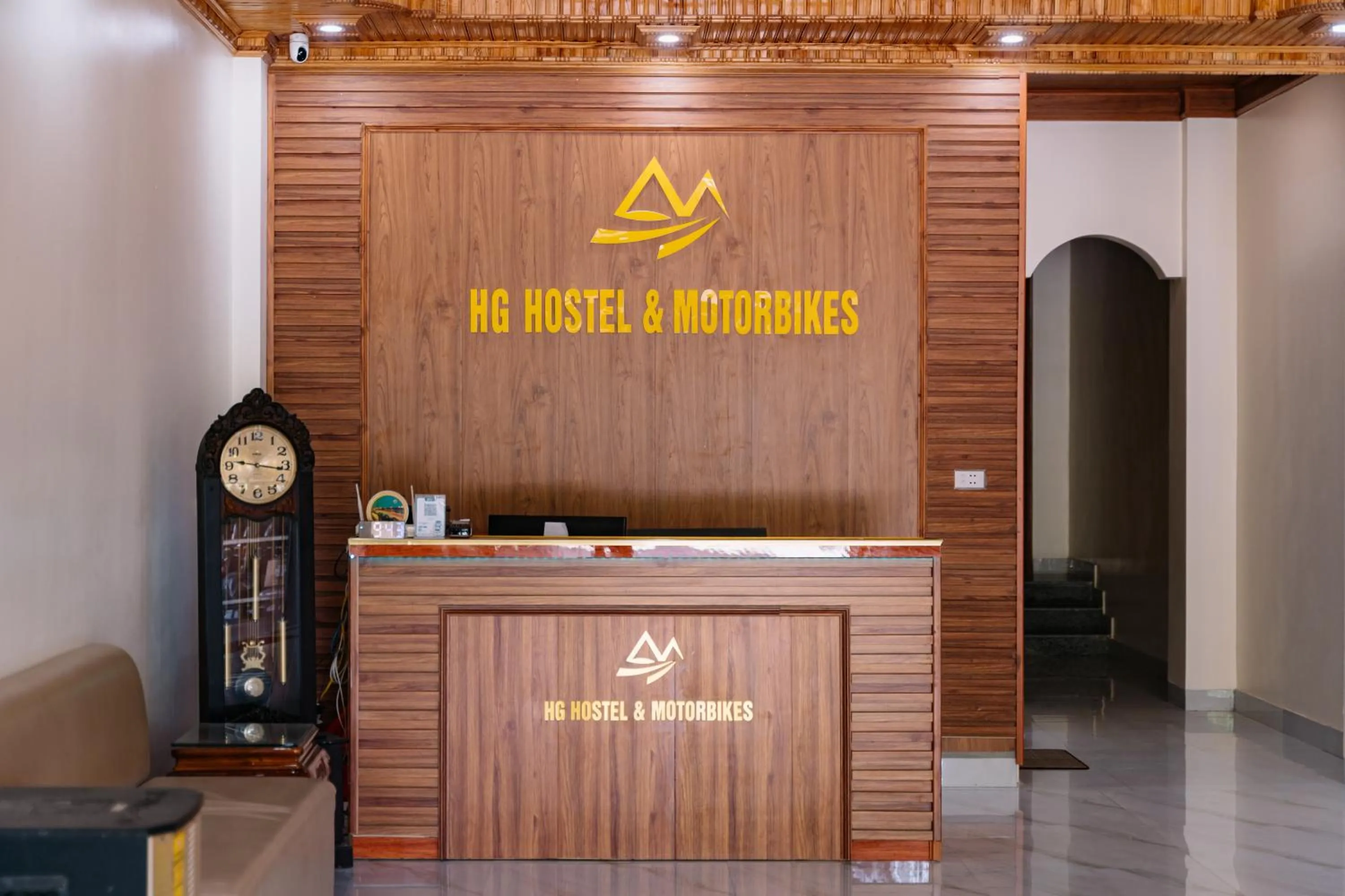 Property logo or sign in HG Hostel provide Tours & Motorbikes