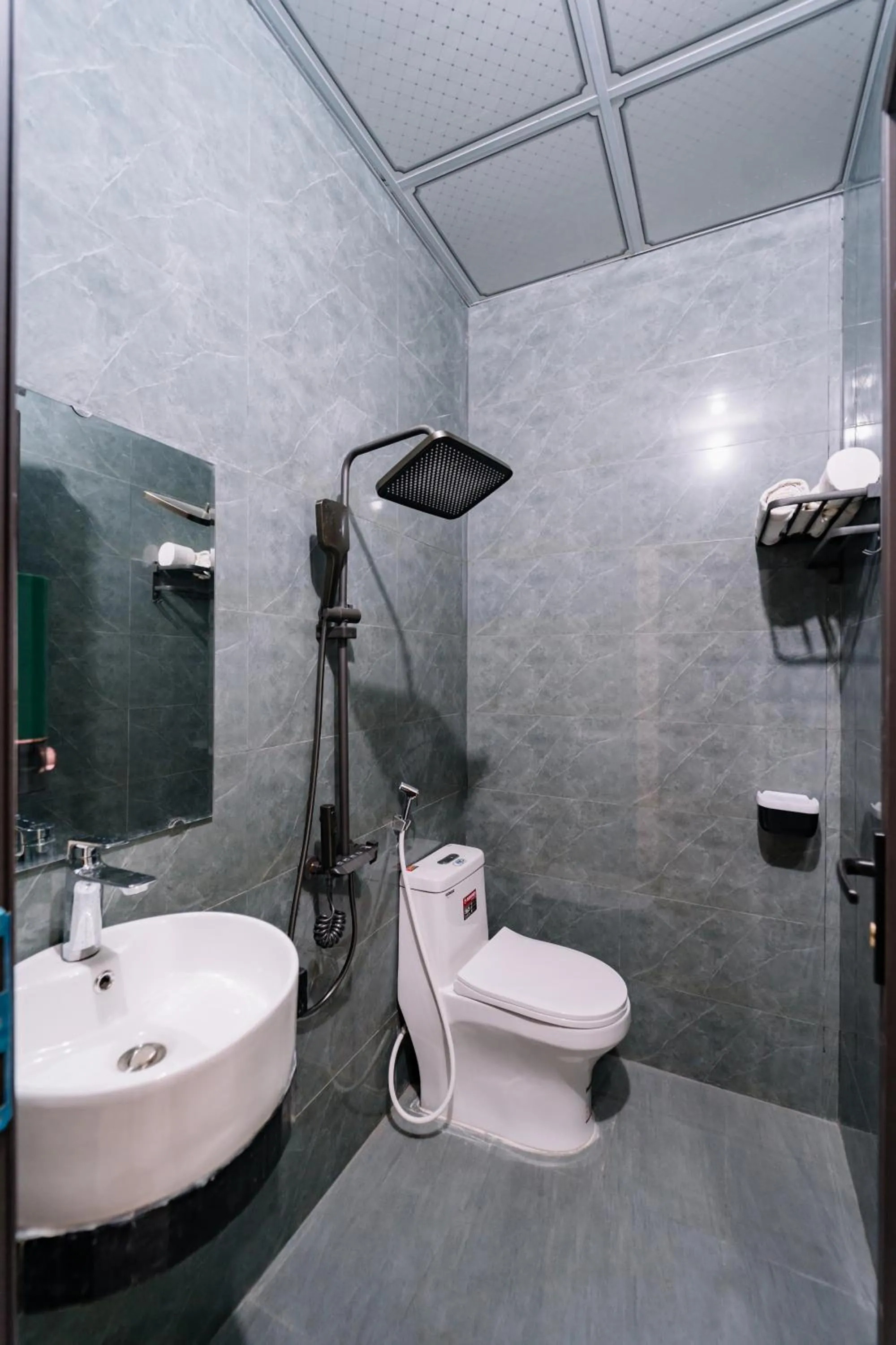 Shower in HG Hostel provide Tours & Motorbikes
