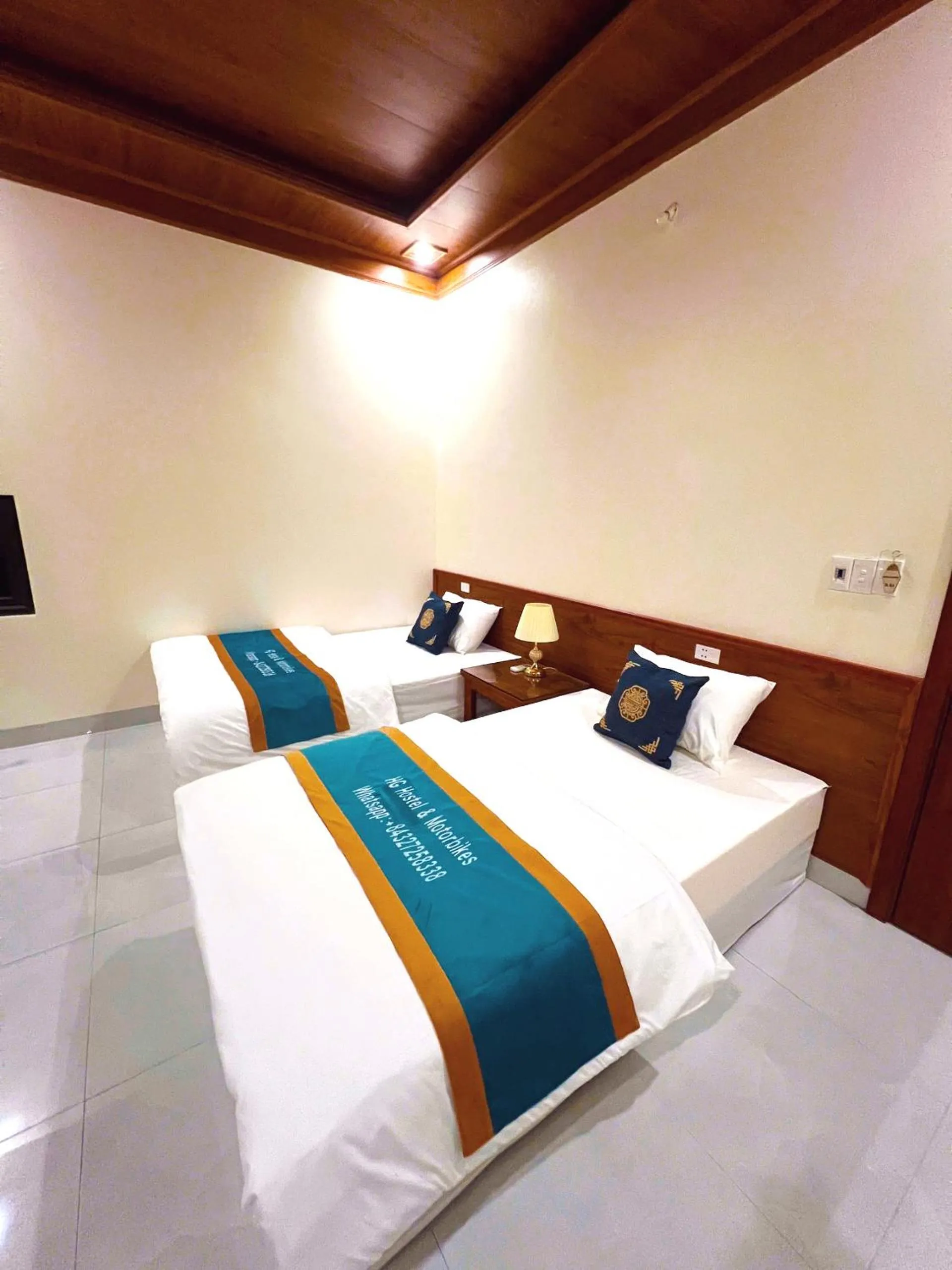 Bed in HG Hostel provide Tours & Motorbikes