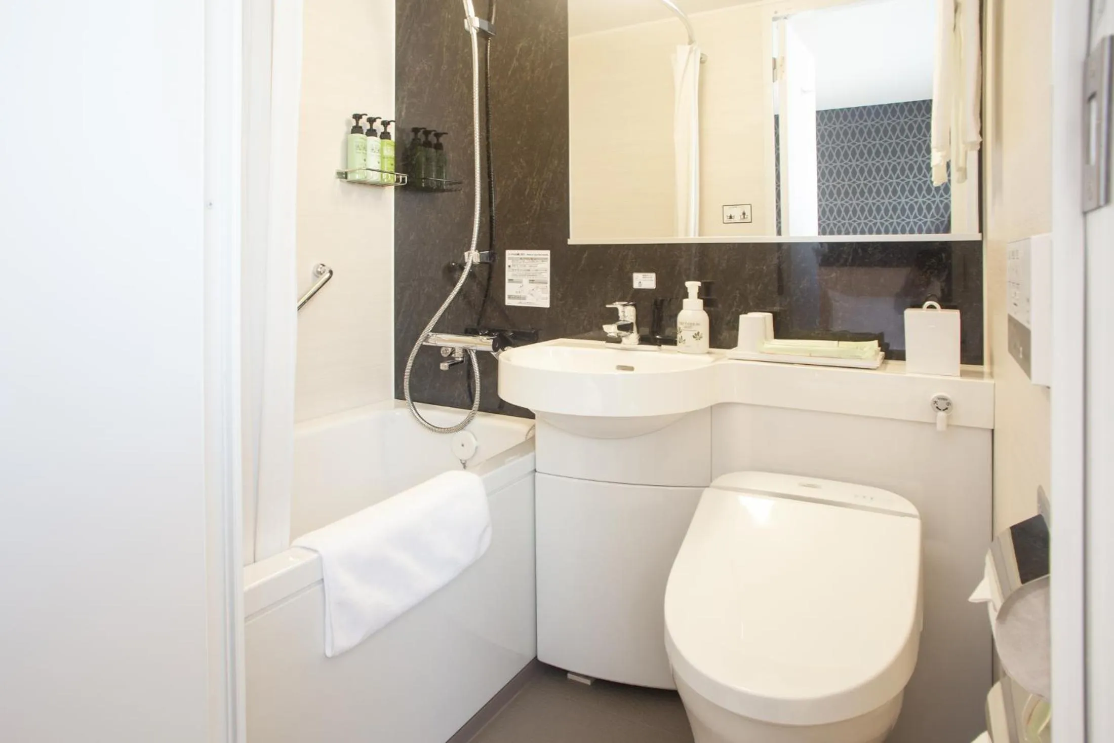 Bathroom in Kuretake Inn Premium Fukuroi Ekimae