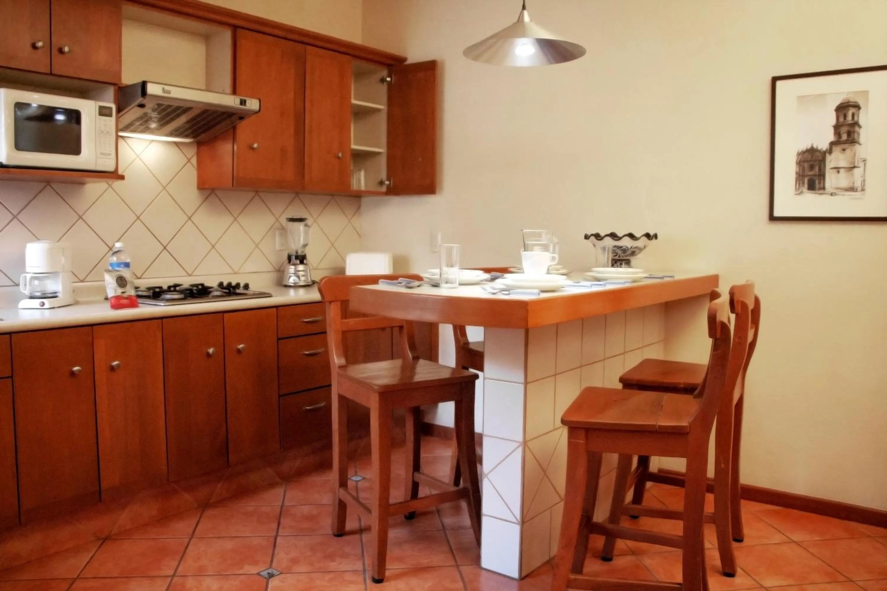 Kitchen or kitchenette in Alcazar Suites