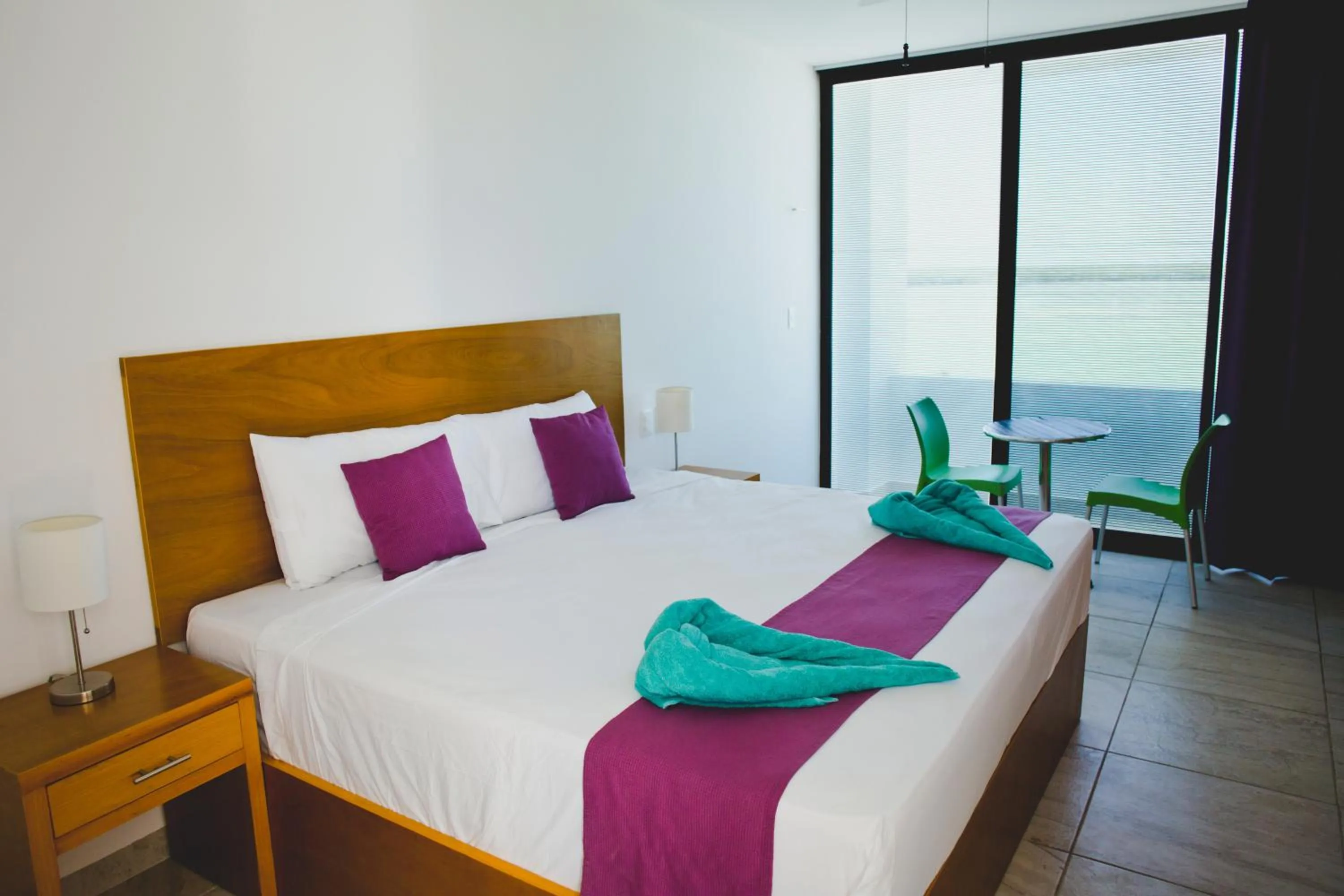 Bed in Yuum Ha Boutique Hotel