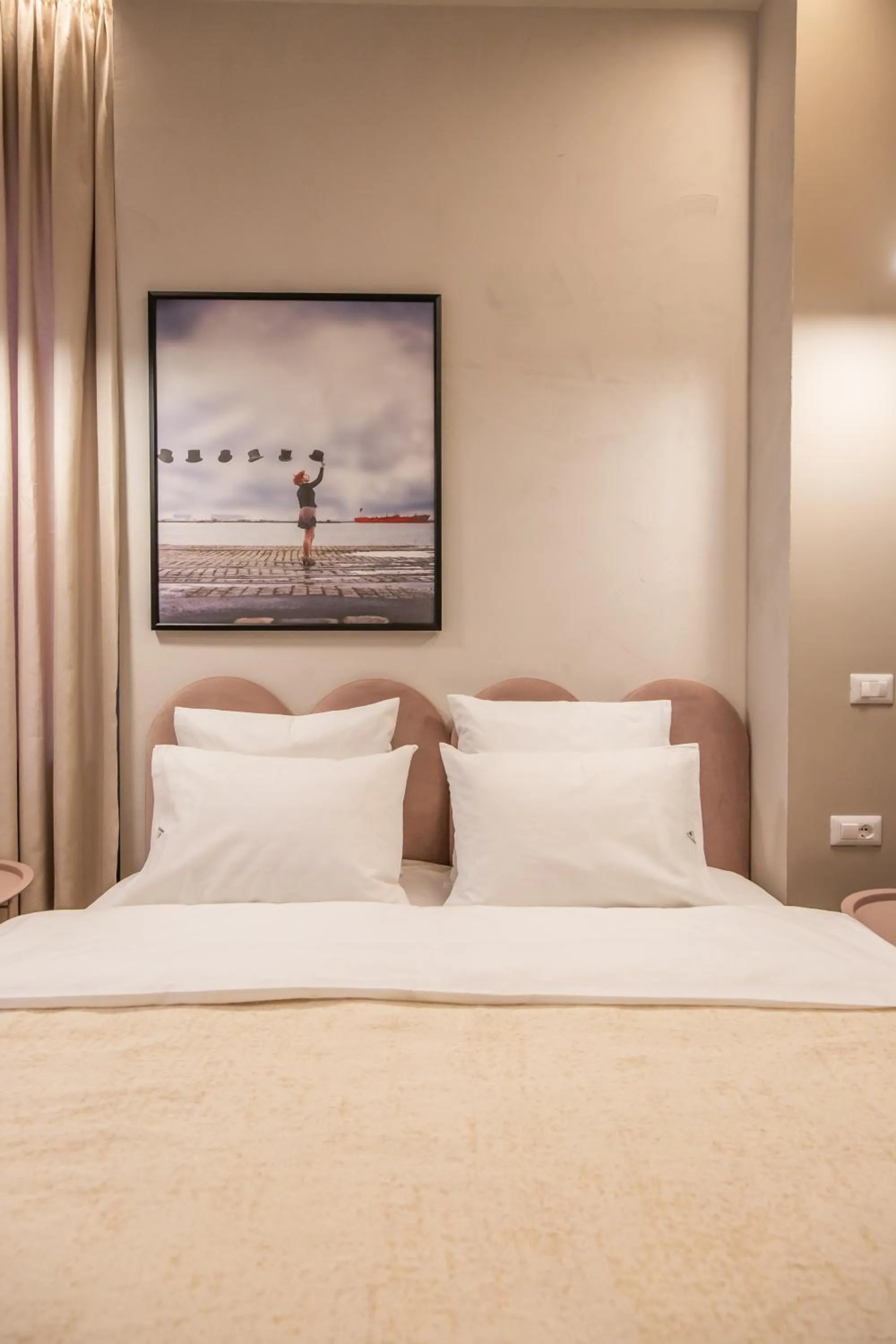 Bed in Allure Boutique Hotel