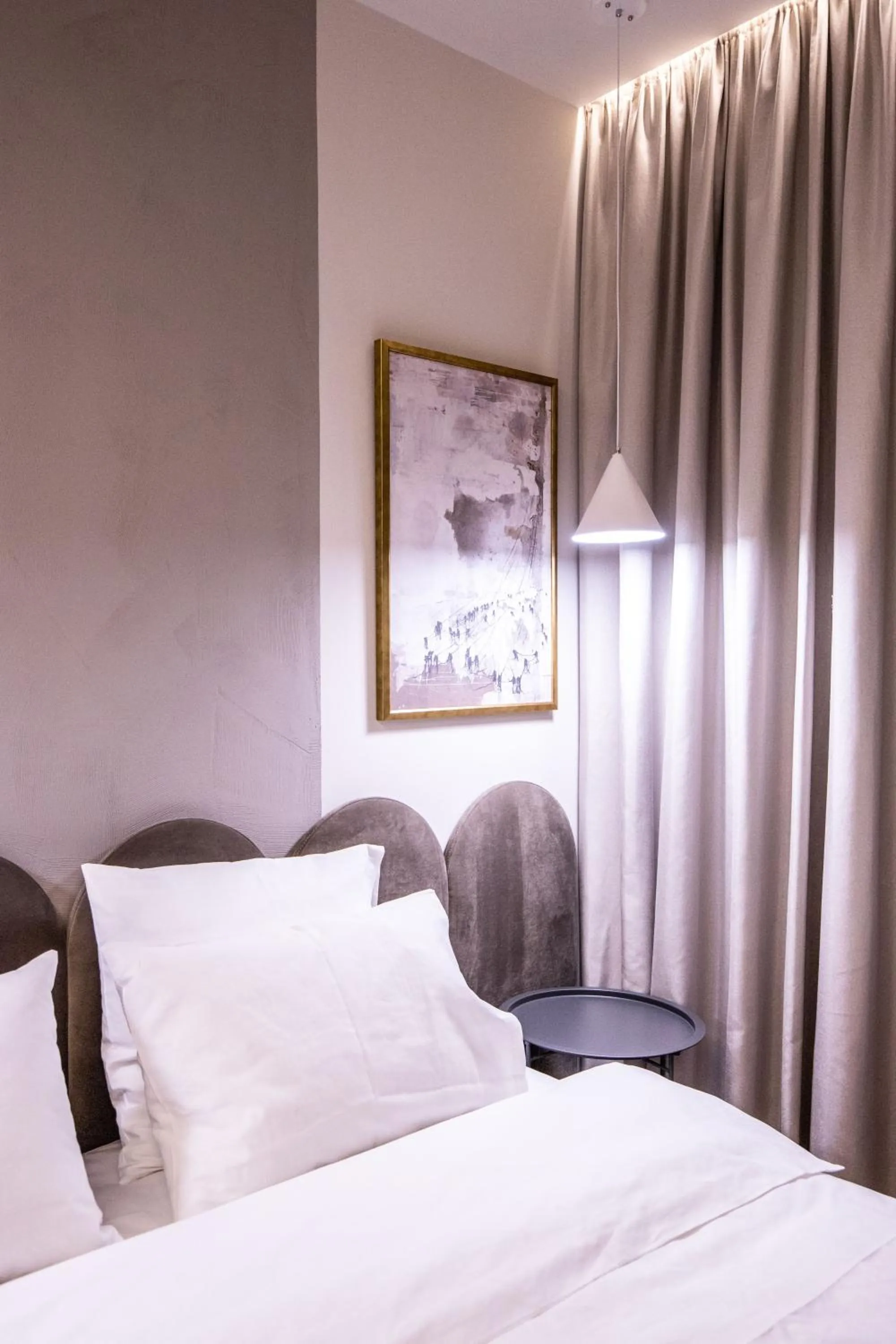 Bed in Allure Boutique Hotel