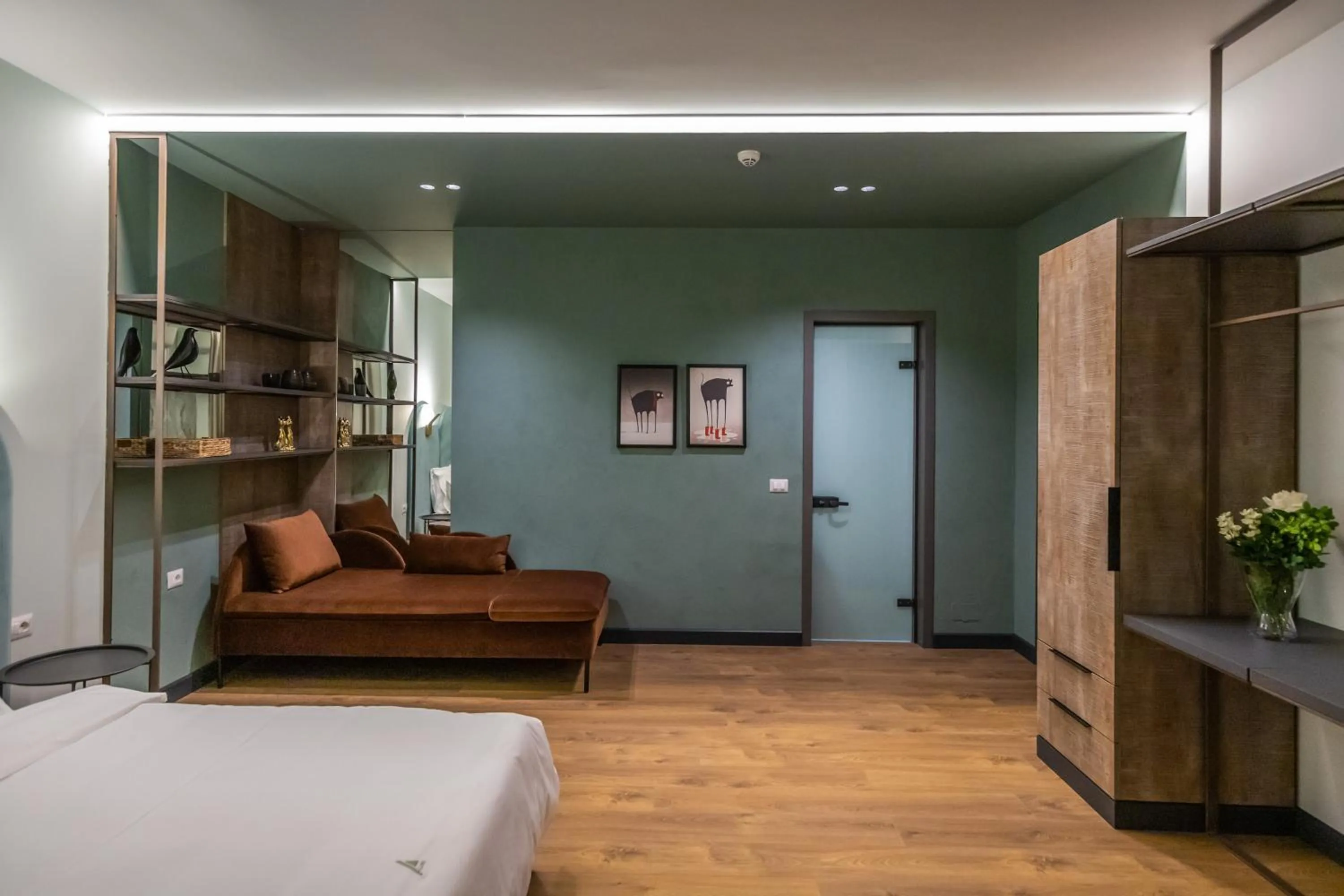 Seating area, Bed in Allure Boutique Hotel