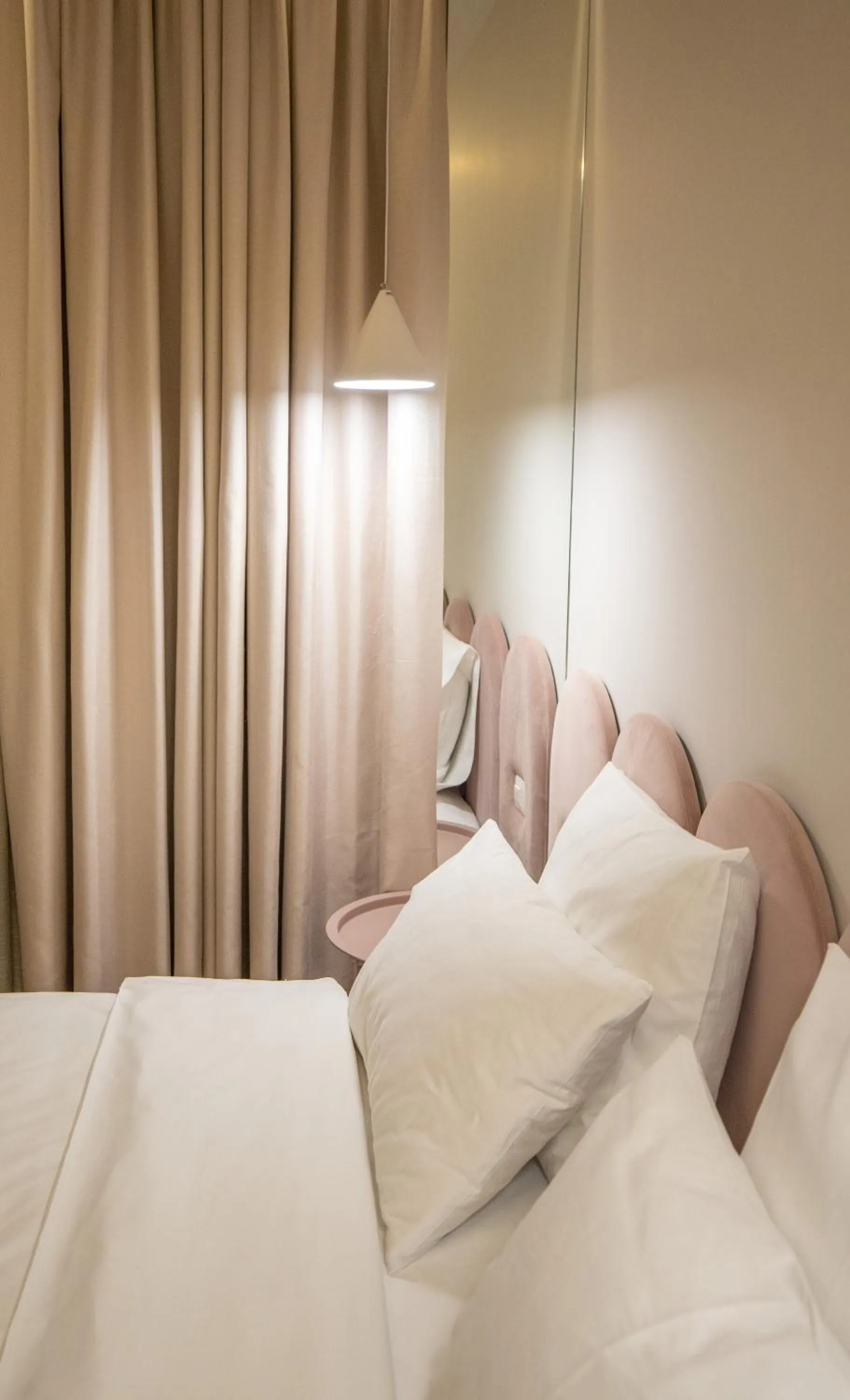 Bed in Allure Boutique Hotel