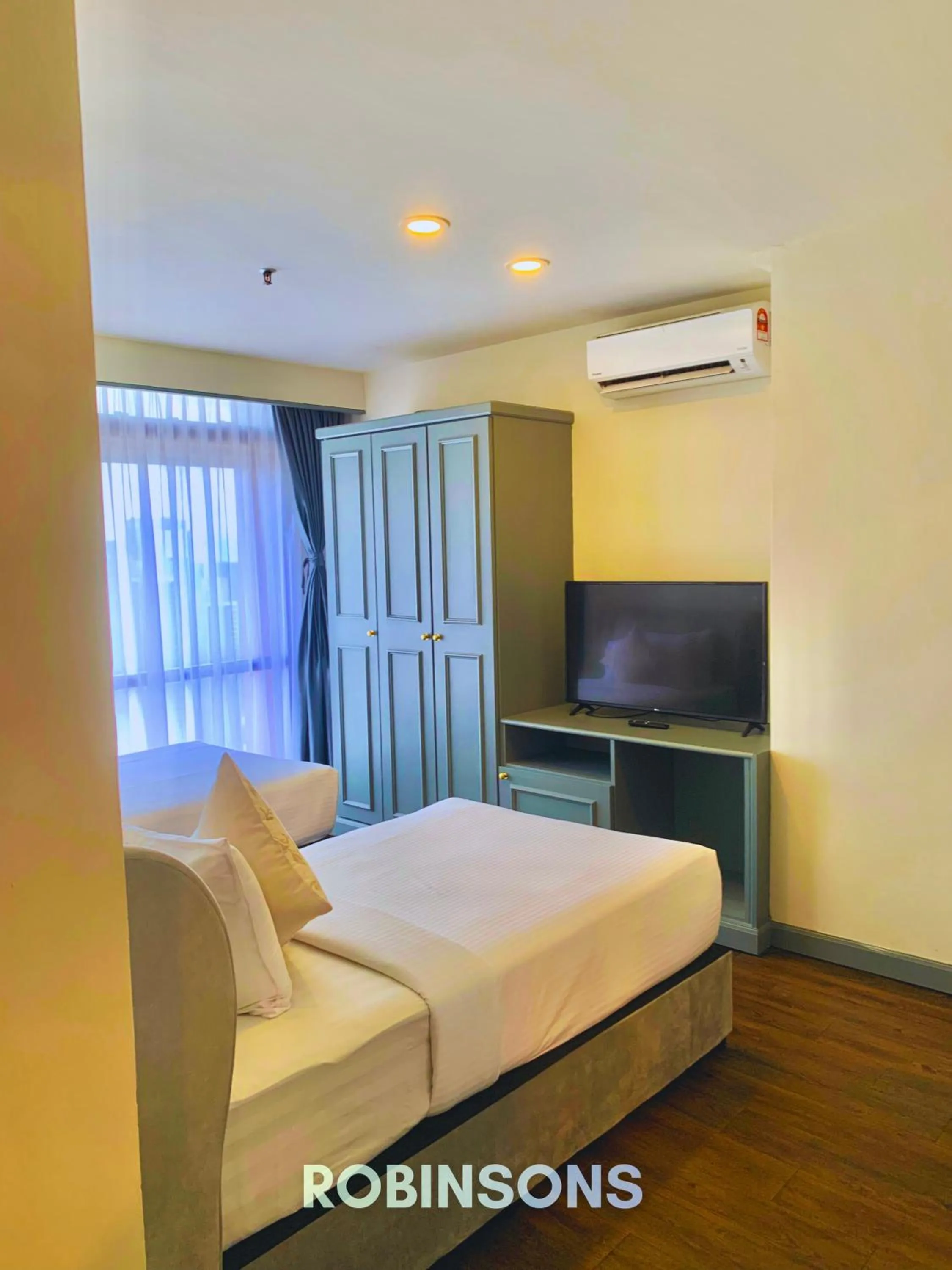 Bed in Serviced Apartments at Times Square Kuala Lumpur by Robinsons