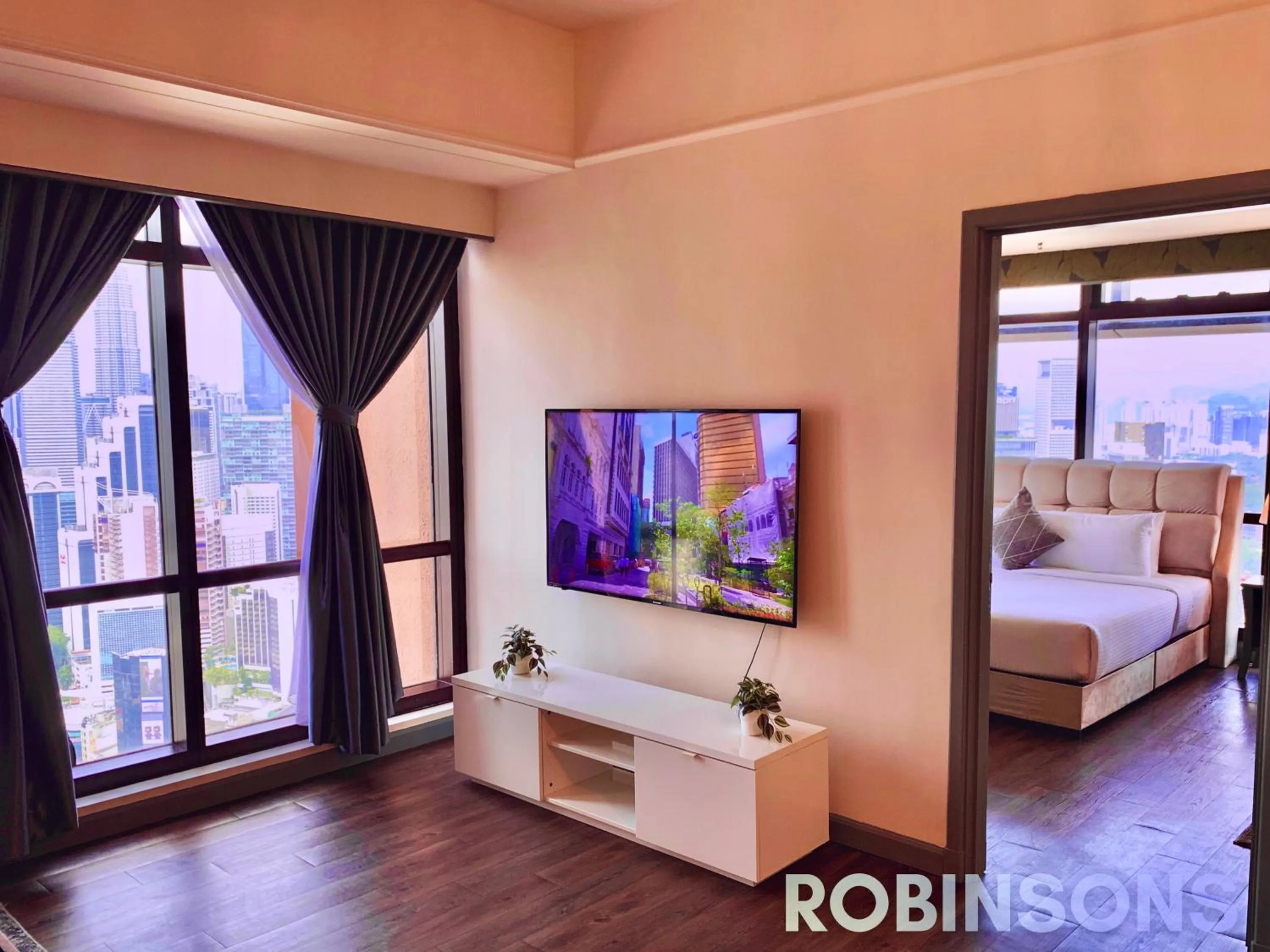Communal lounge/ TV room, Bed in Serviced Apartments at Times Square Kuala Lumpur by Robinsons