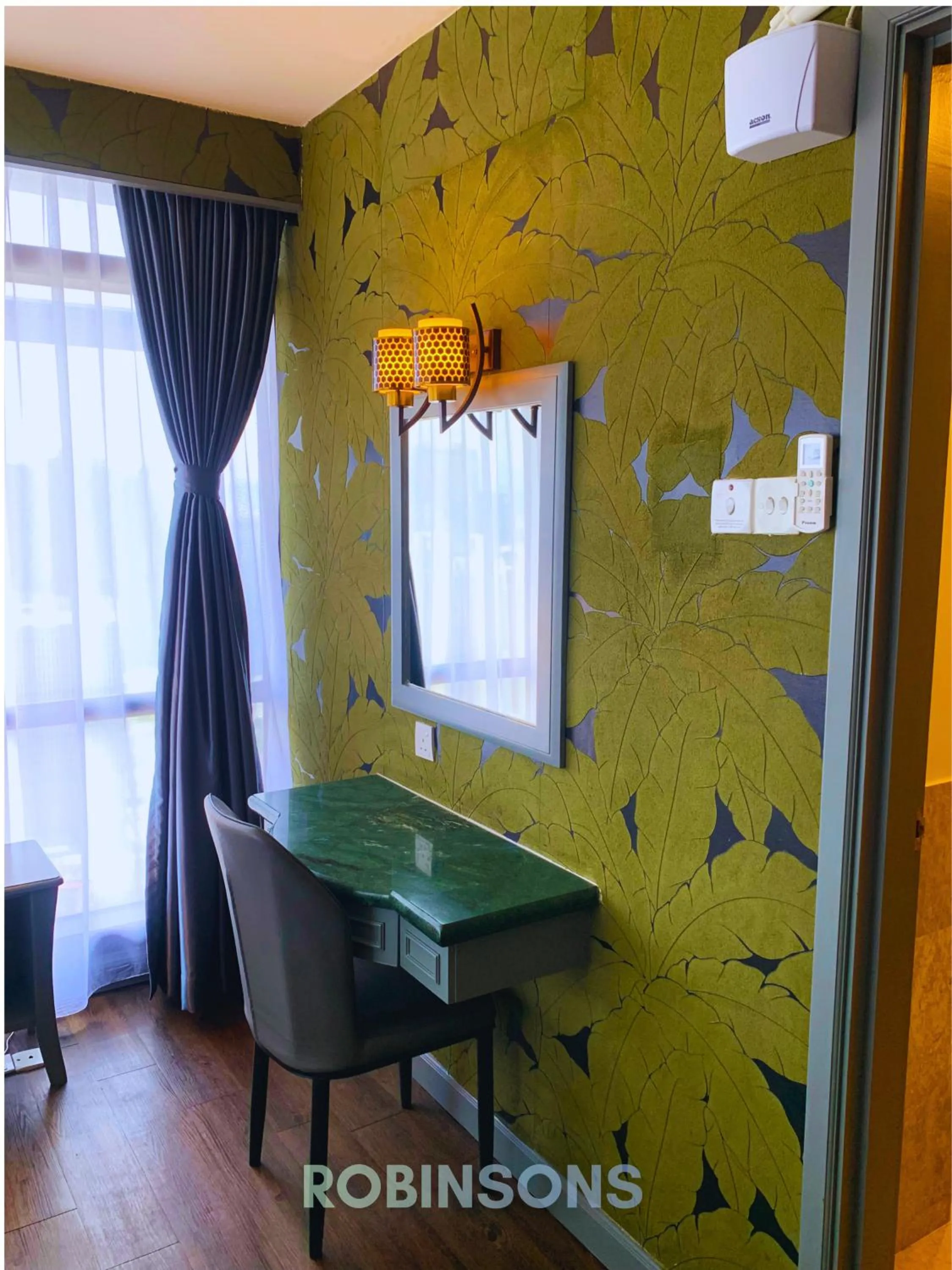 Seating area in Serviced Apartments at Times Square Kuala Lumpur by Robinsons