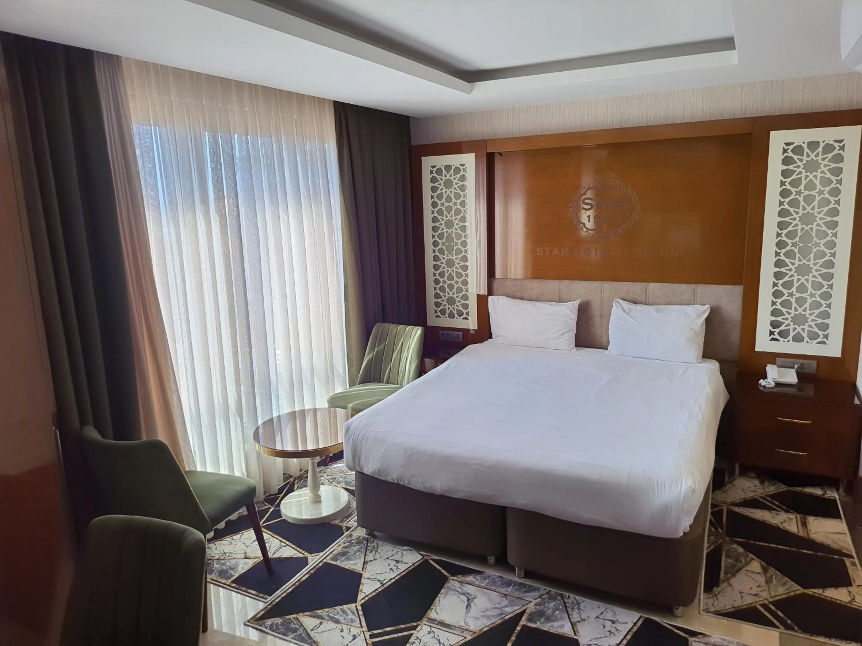 Bed in Grand Star Hotel Premium