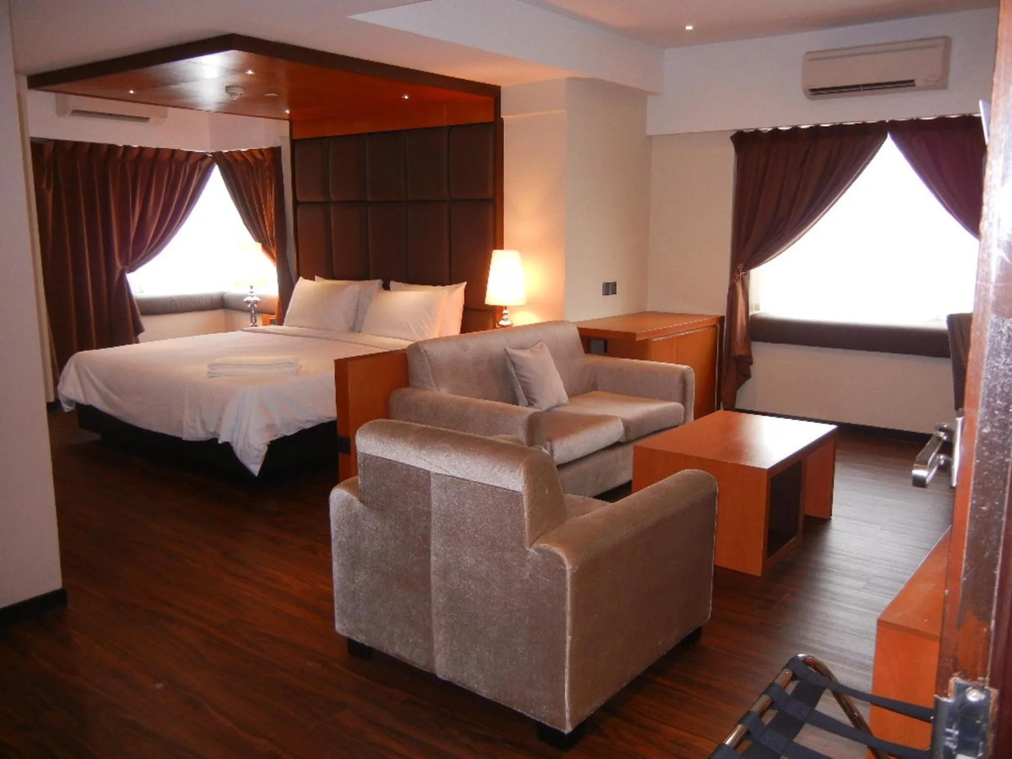 Living room, Bed in C'haya Hotel