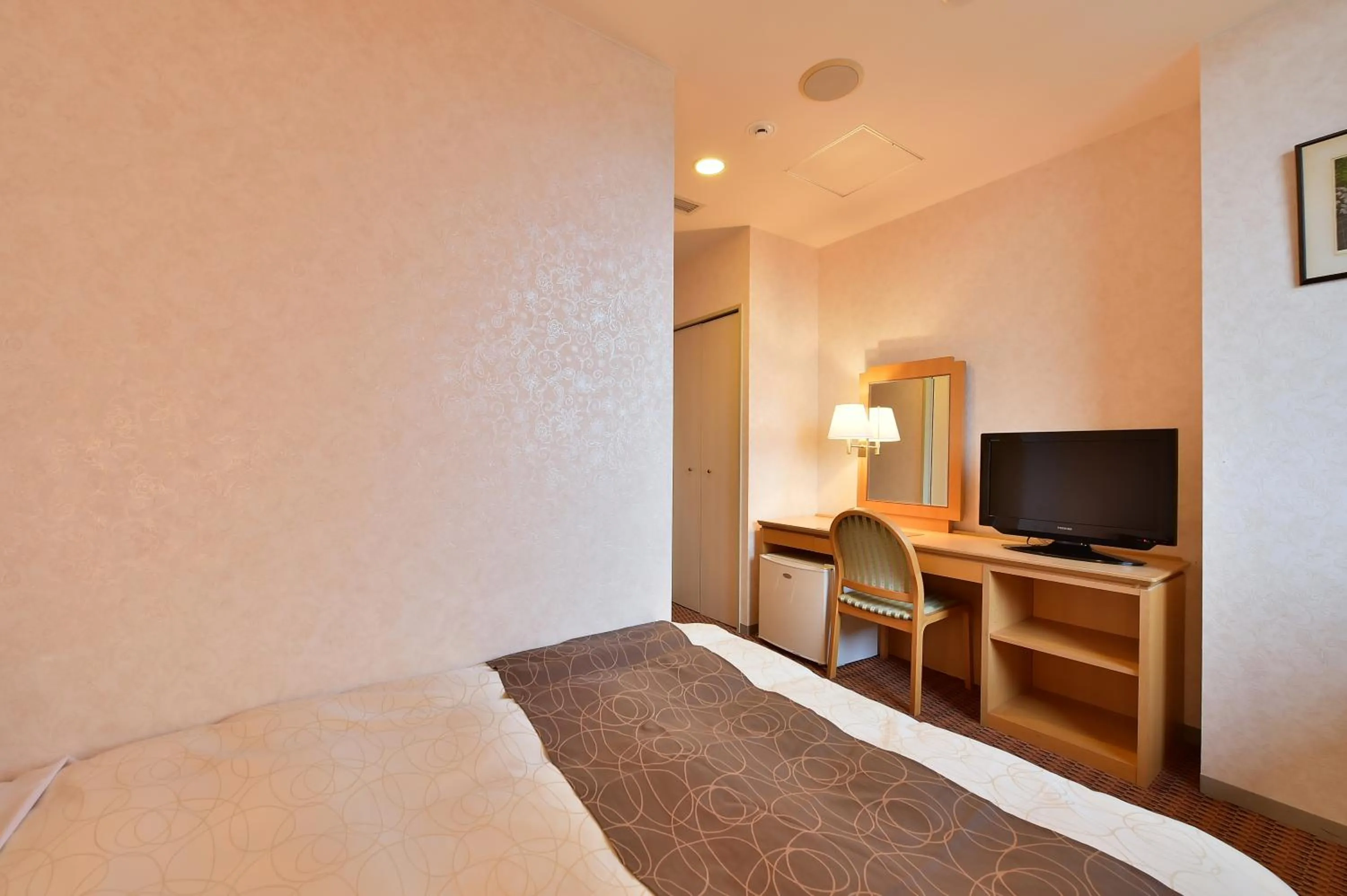 Bed in KKR Kyoto Kuniso