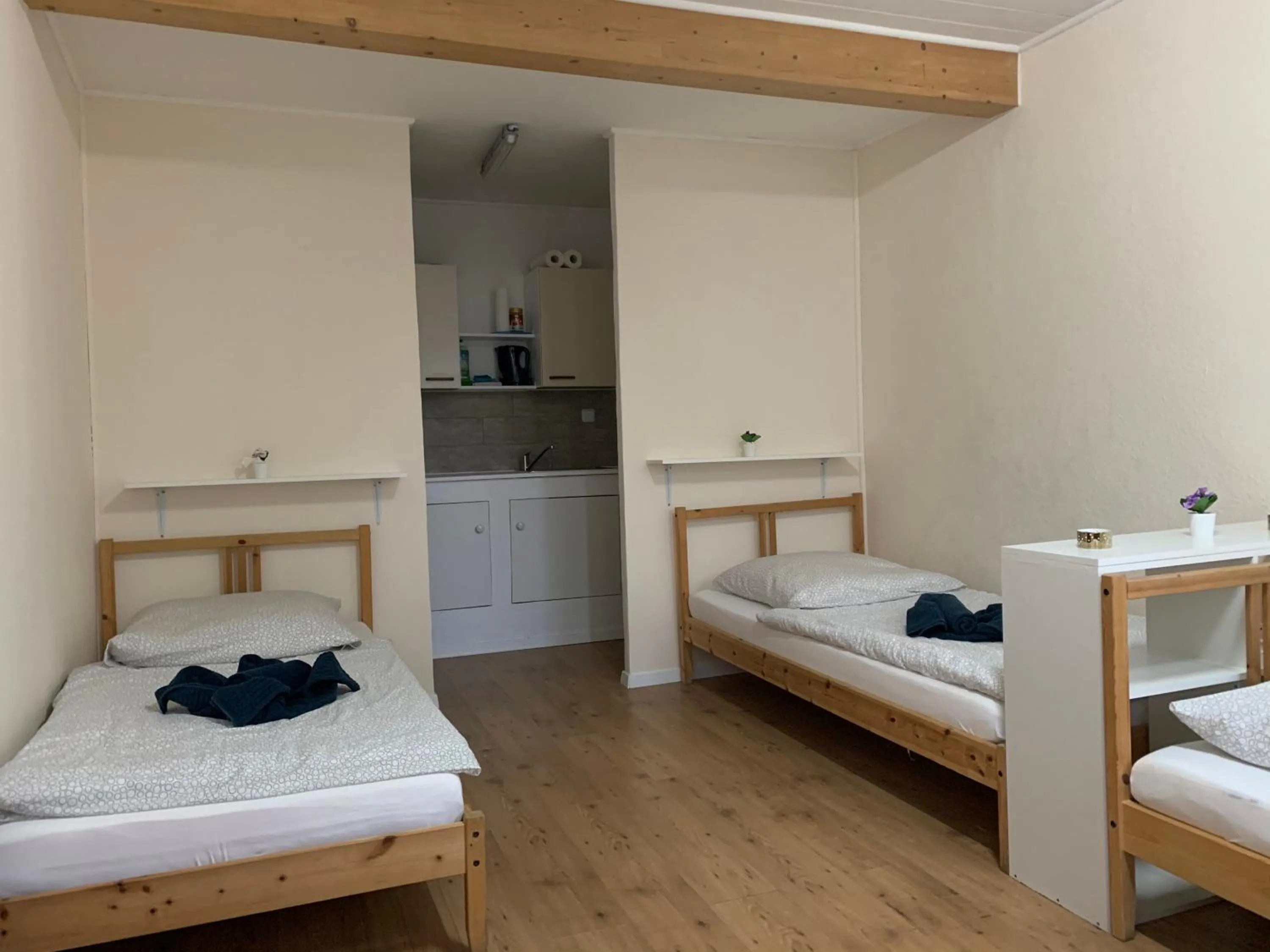 Bed in Belle Vue Apartrooms