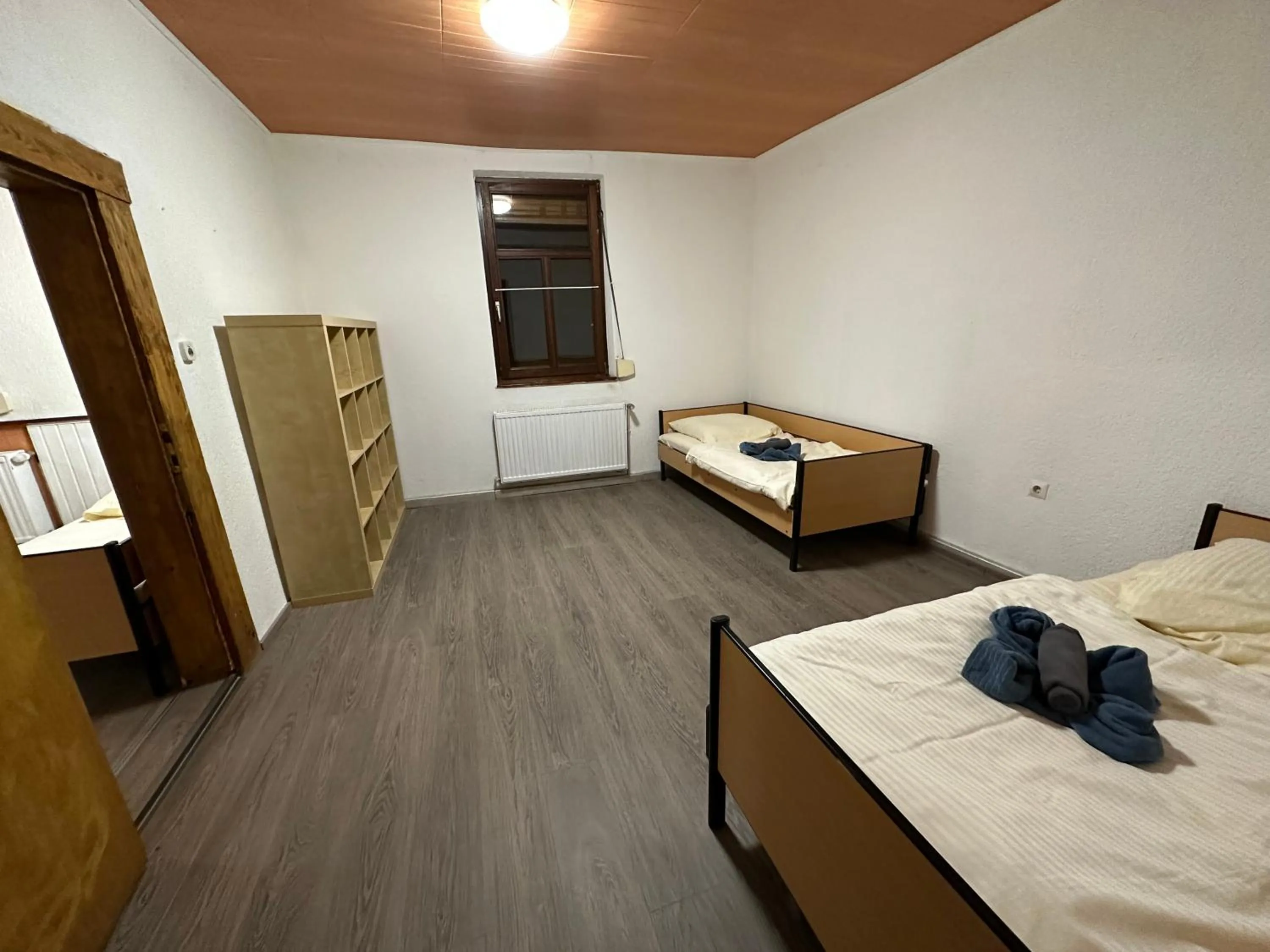 Bed in Belle Vue Apartrooms