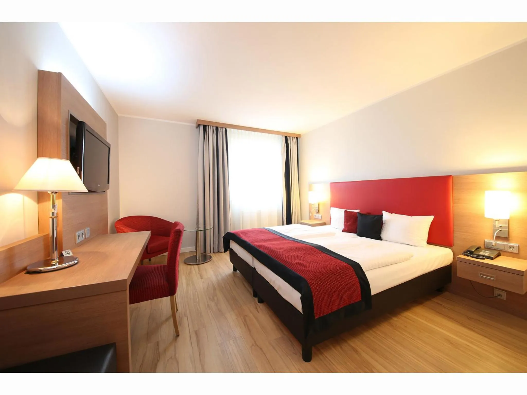 Photo of the whole room, Bed in Congress Hotel am Stadtpark