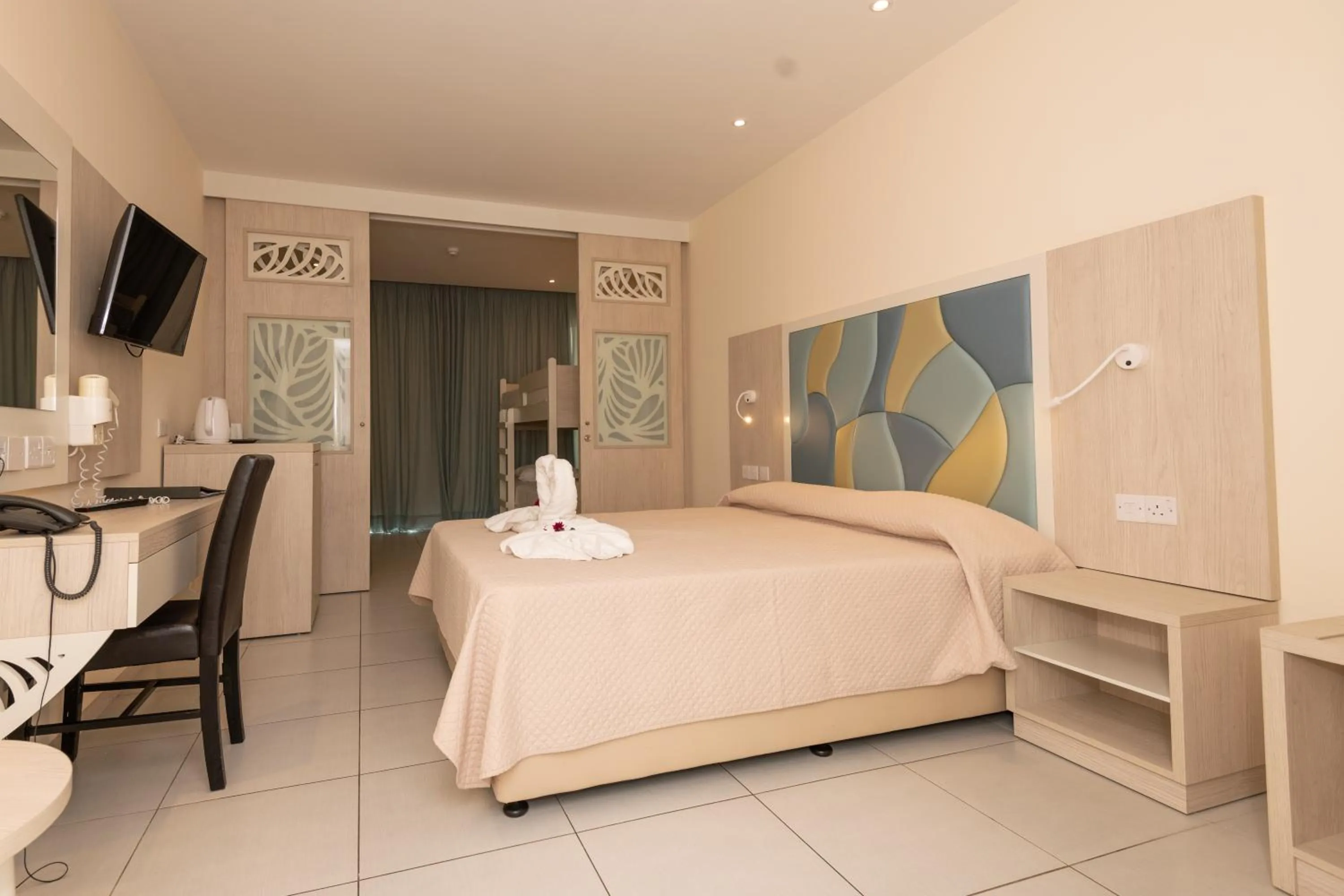 Bed in Tofinis Hotel