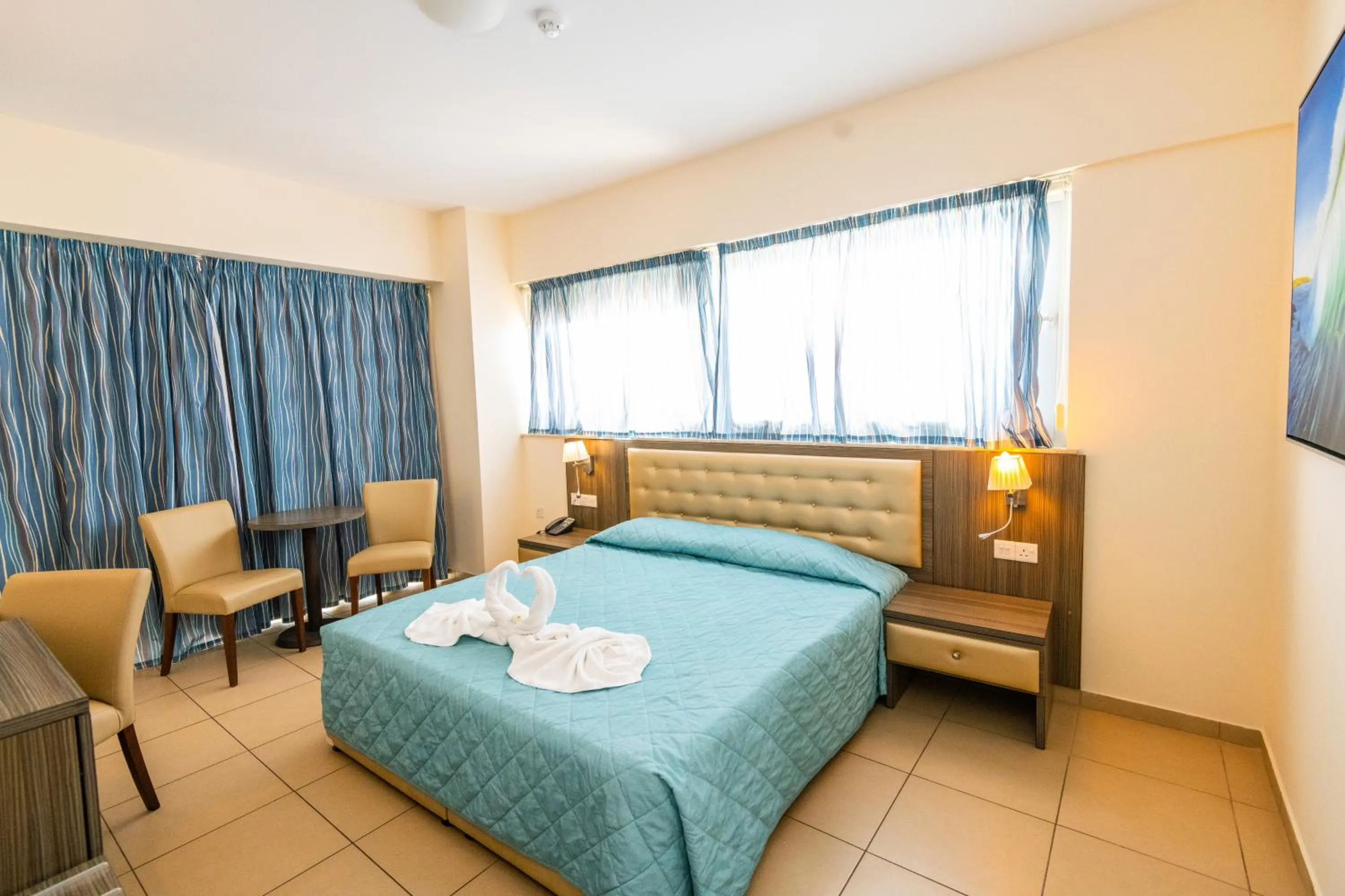 Bed in Tofinis Hotel