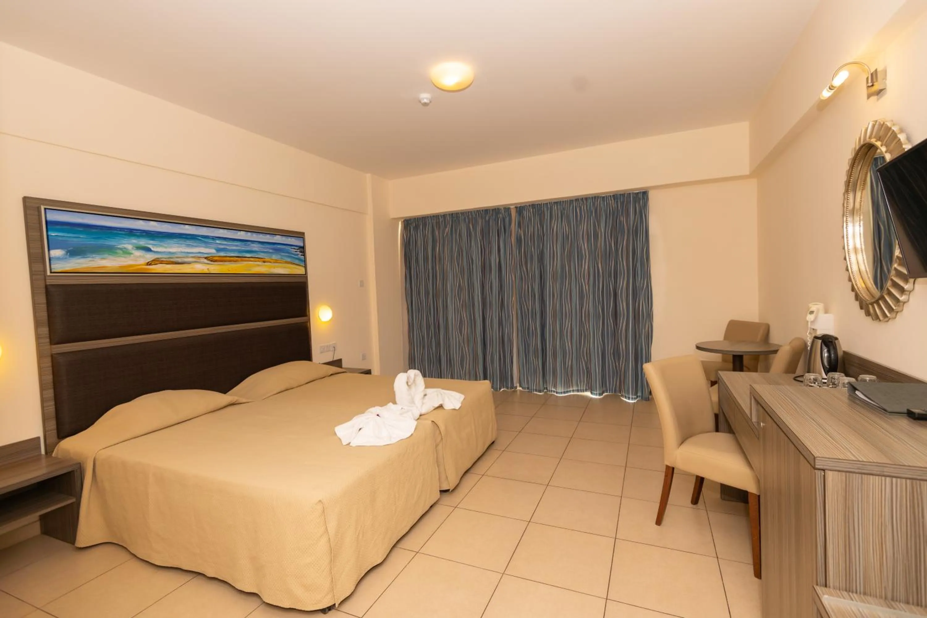 Bed in Tofinis Hotel