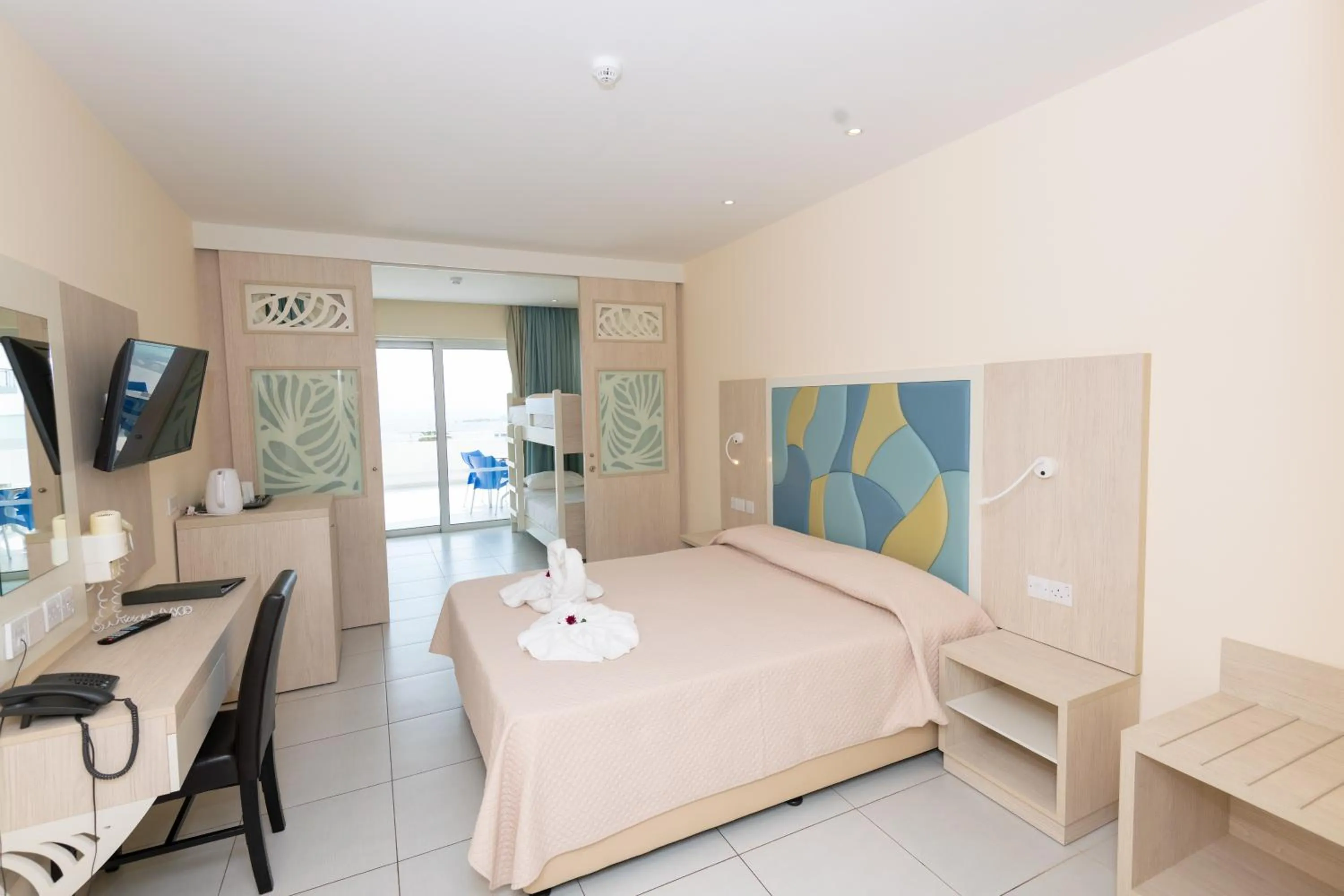 Bed in Tofinis Hotel