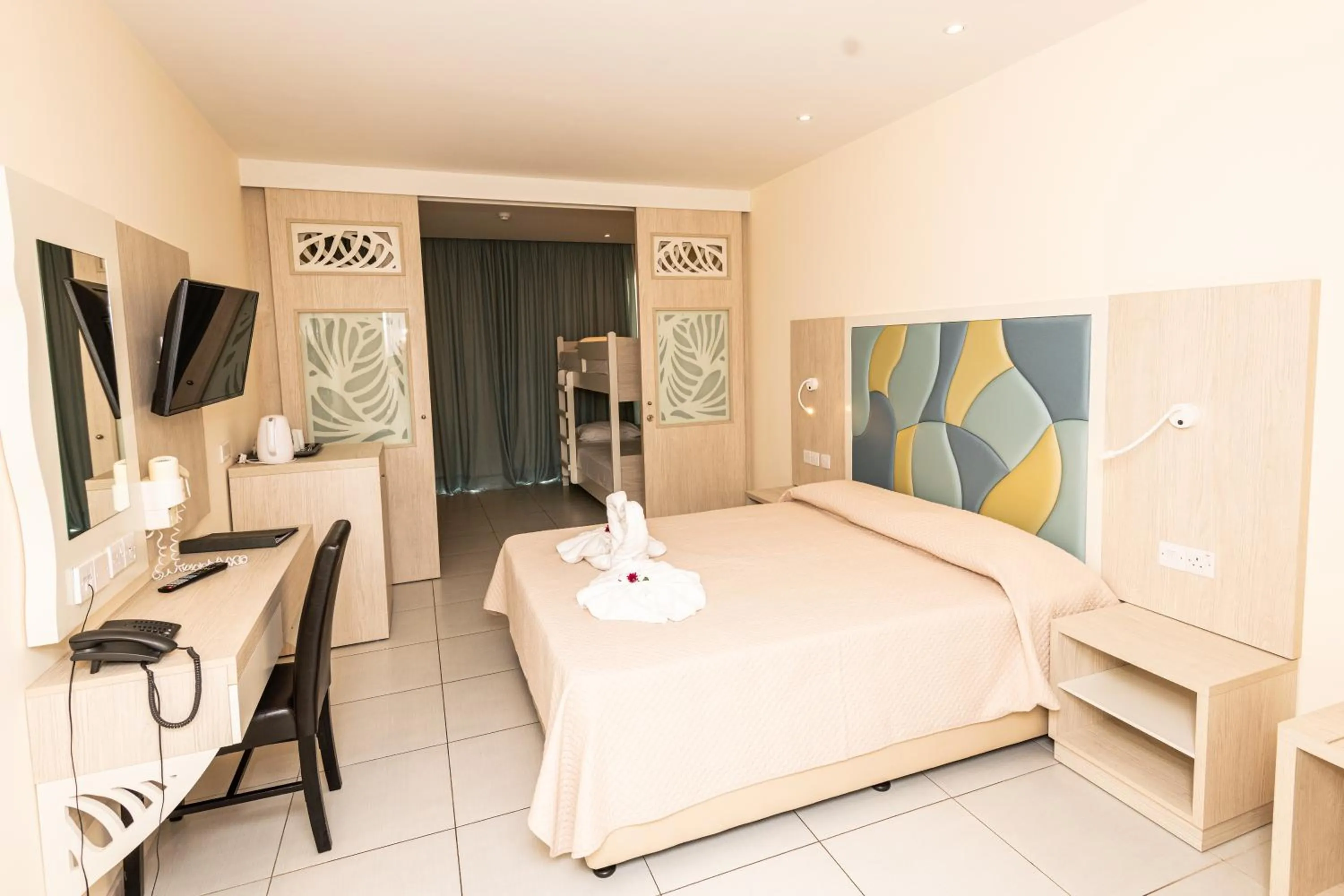 Bed in Tofinis Hotel