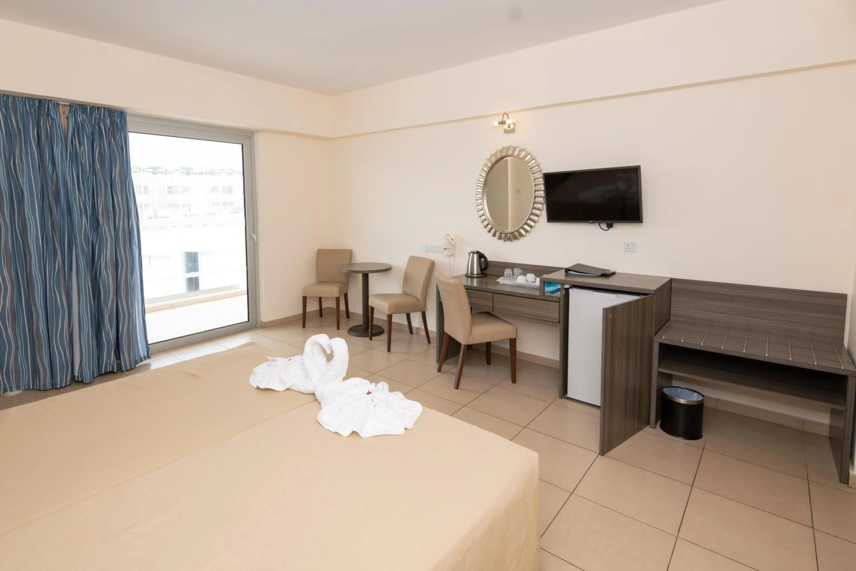 Bed in Tofinis Hotel