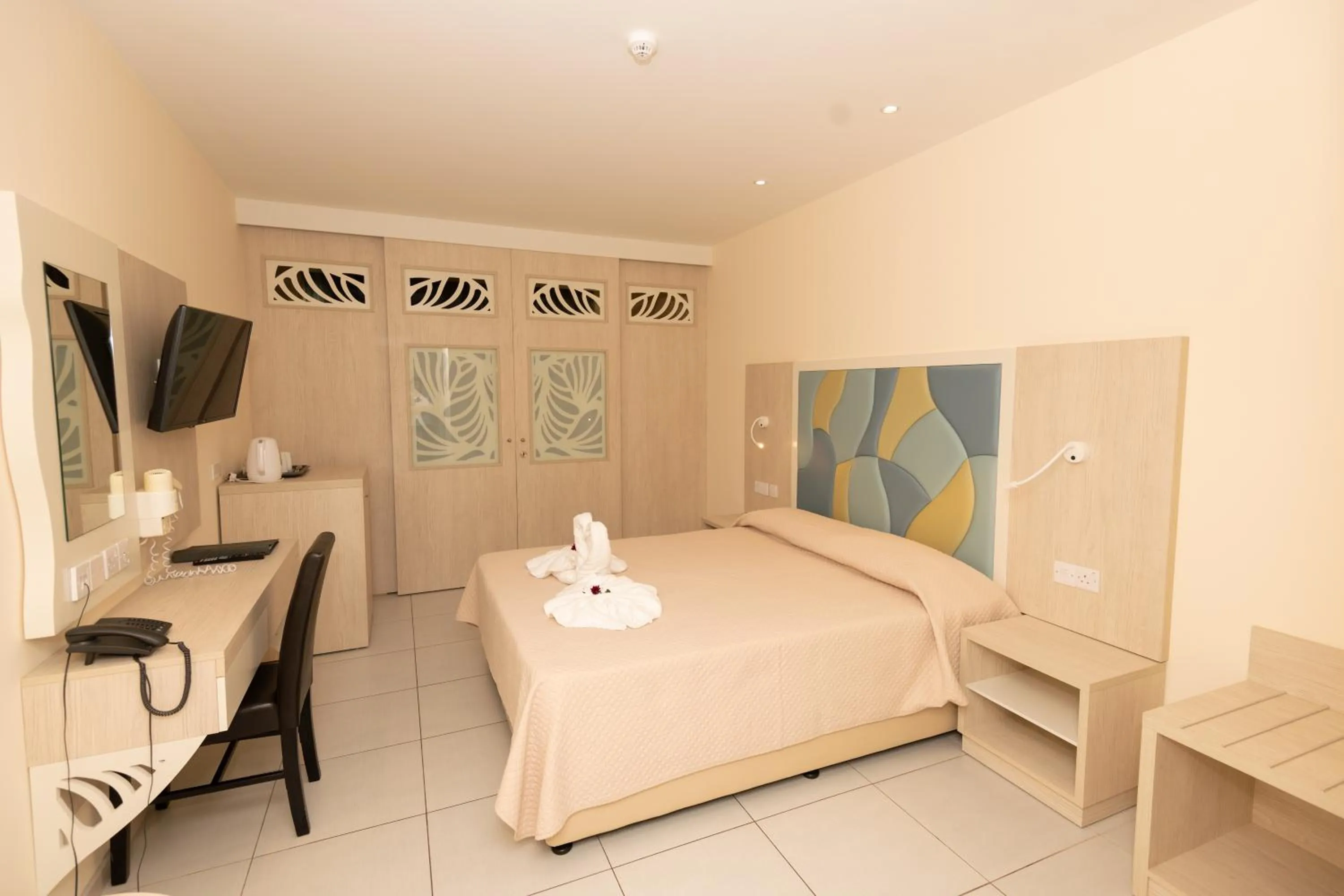 Bed in Tofinis Hotel