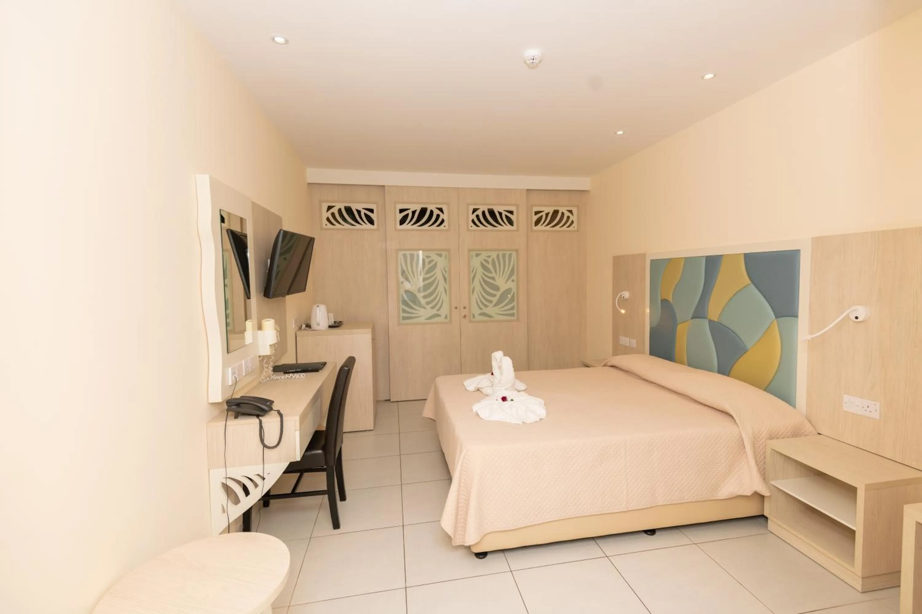 Bed in Tofinis Hotel