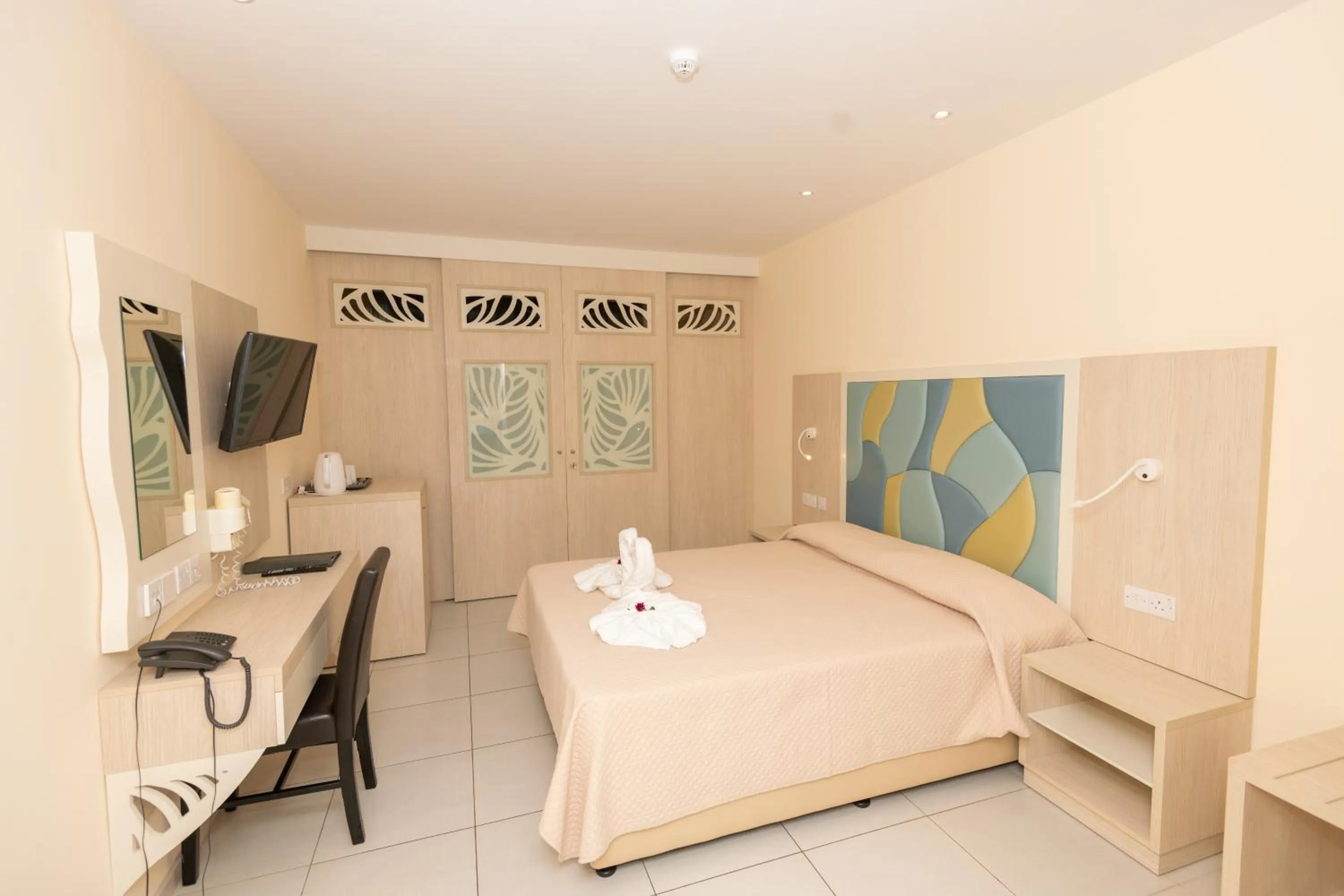 Bed in Tofinis Hotel