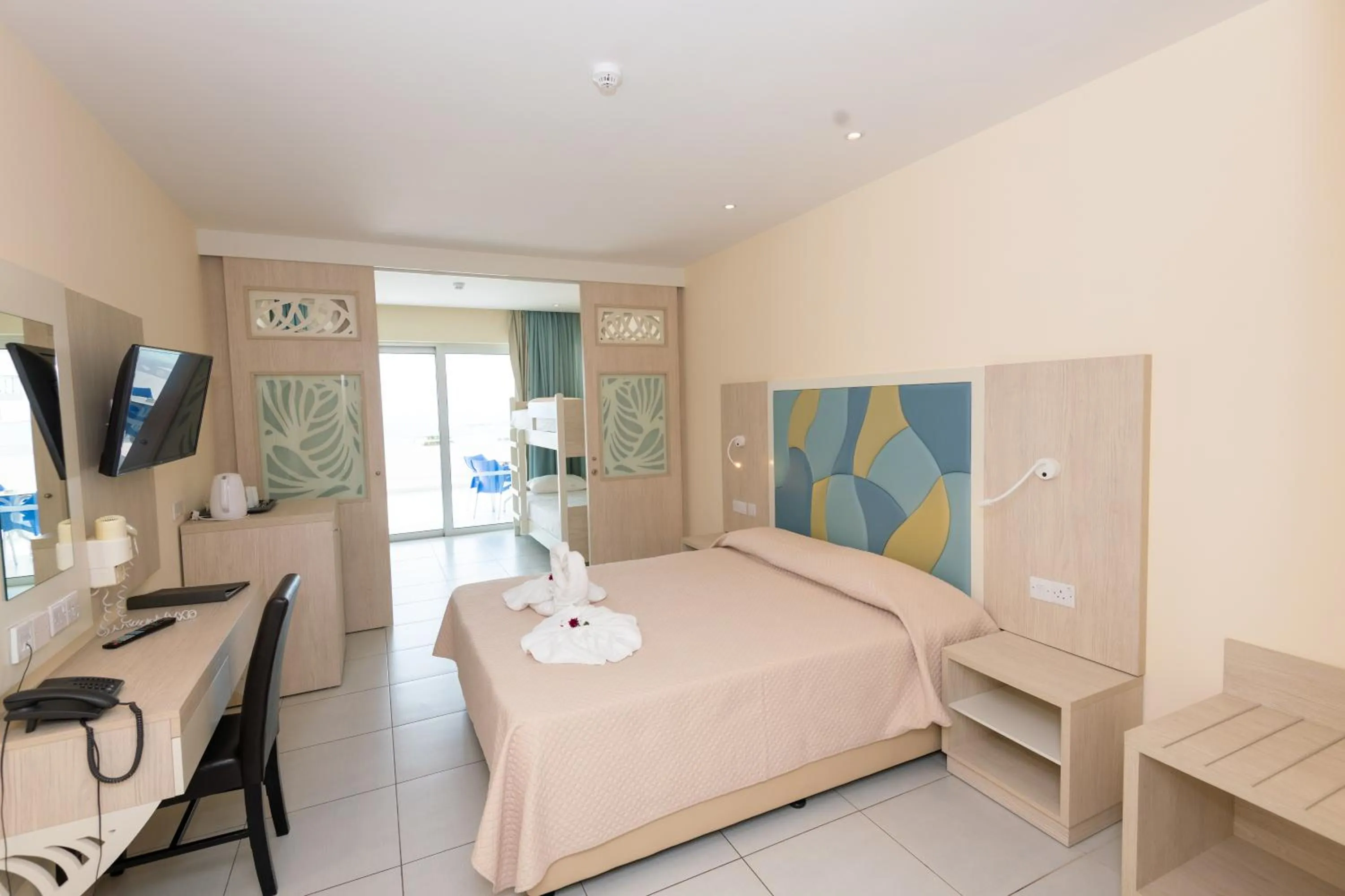 Bed in Tofinis Hotel